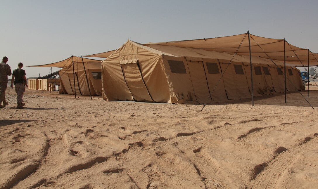 Marines from 3rd Marine Aircraft Wing (Forward) completed this temporary site here Aug. 21 in preparation for the arrival of a detachment from the 26th Marine Expeditionary Unit. The site consists of four climate-controlled tents, power generators and computer and telephone setup. Marines from 3rd MAW (Fwd) and Marine Wing Support Squadron 274 spent about a day leveling the ground completing the setup.