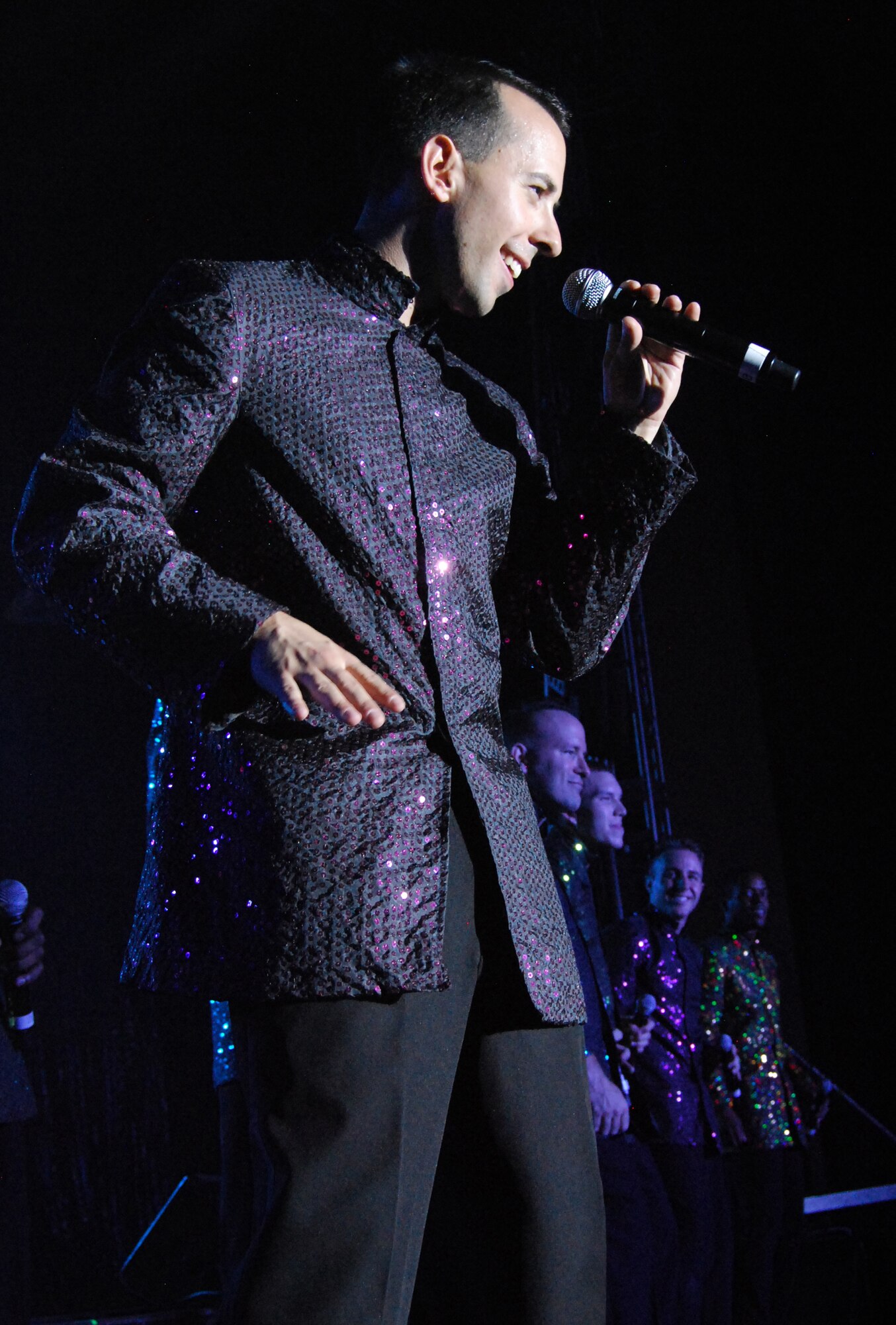 Senior Airman Devin Martin performs during a Tops in Blue appearance at the Air Force Academy's Arnold Hall Theater Aug. 22, 2010. Airman Martin is a native of Salina, Kan., and a cyberspace support technician with the 55th Strategic Communications Squadron at Offutt Air Force Base, Neb. (U.S. Air Force photo/Staff Sgt. Don Branum)