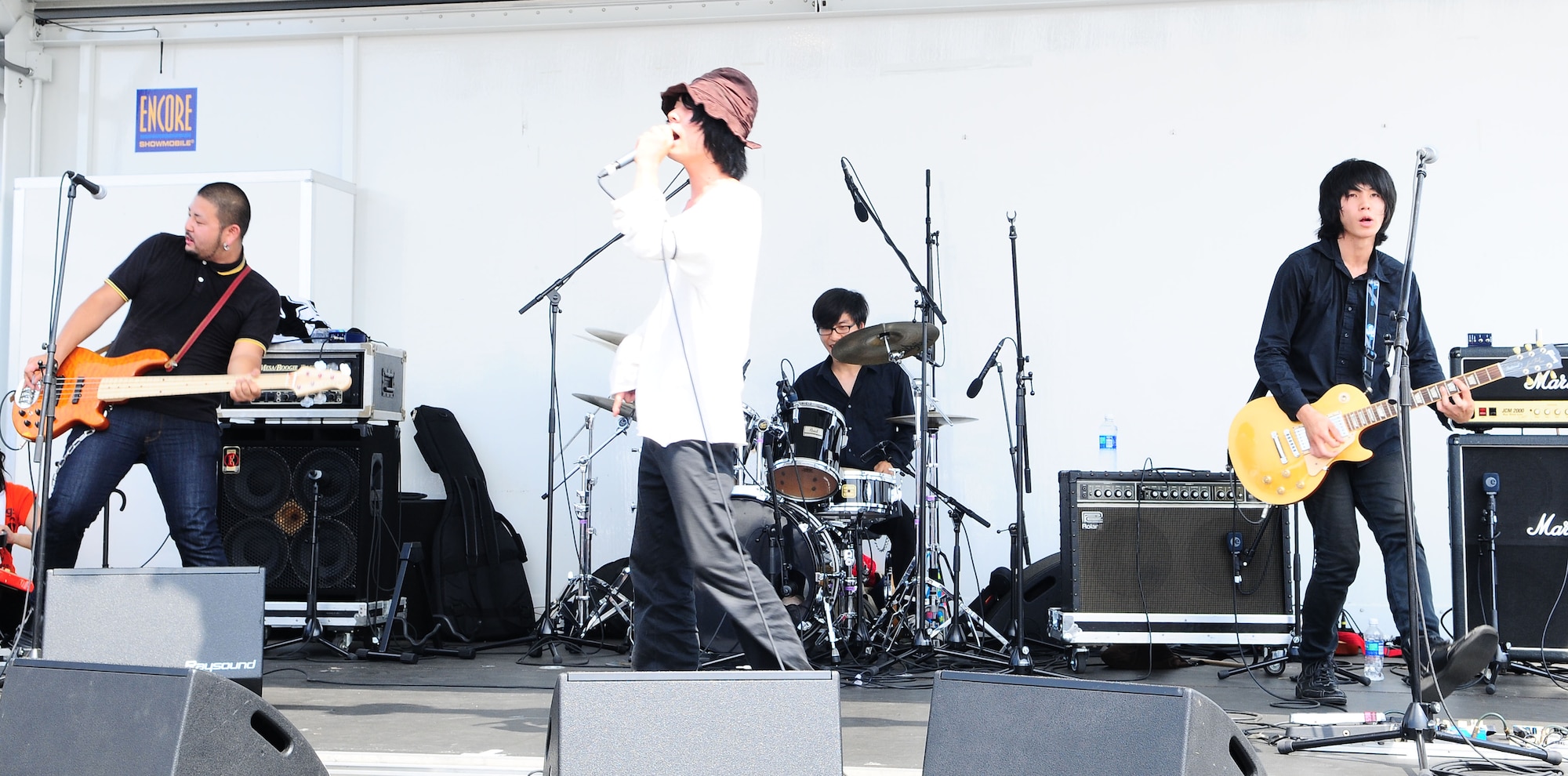 YOKOTA AIR BASE, Japan -- Over the Dogs, a Japanese alternative rock band, entertains the crowd Aug. 21 during the 2010 Yokota Air Base Japanese-American Friendship Festival. Live entertainment, various food and games, 42 aircraft static displays, along with a few aerial demonstrations, drew a crowd of 130,000 to Yokota's annual festival.  (U.S. Air Force photo/Airman 1st Class Sean Martin)