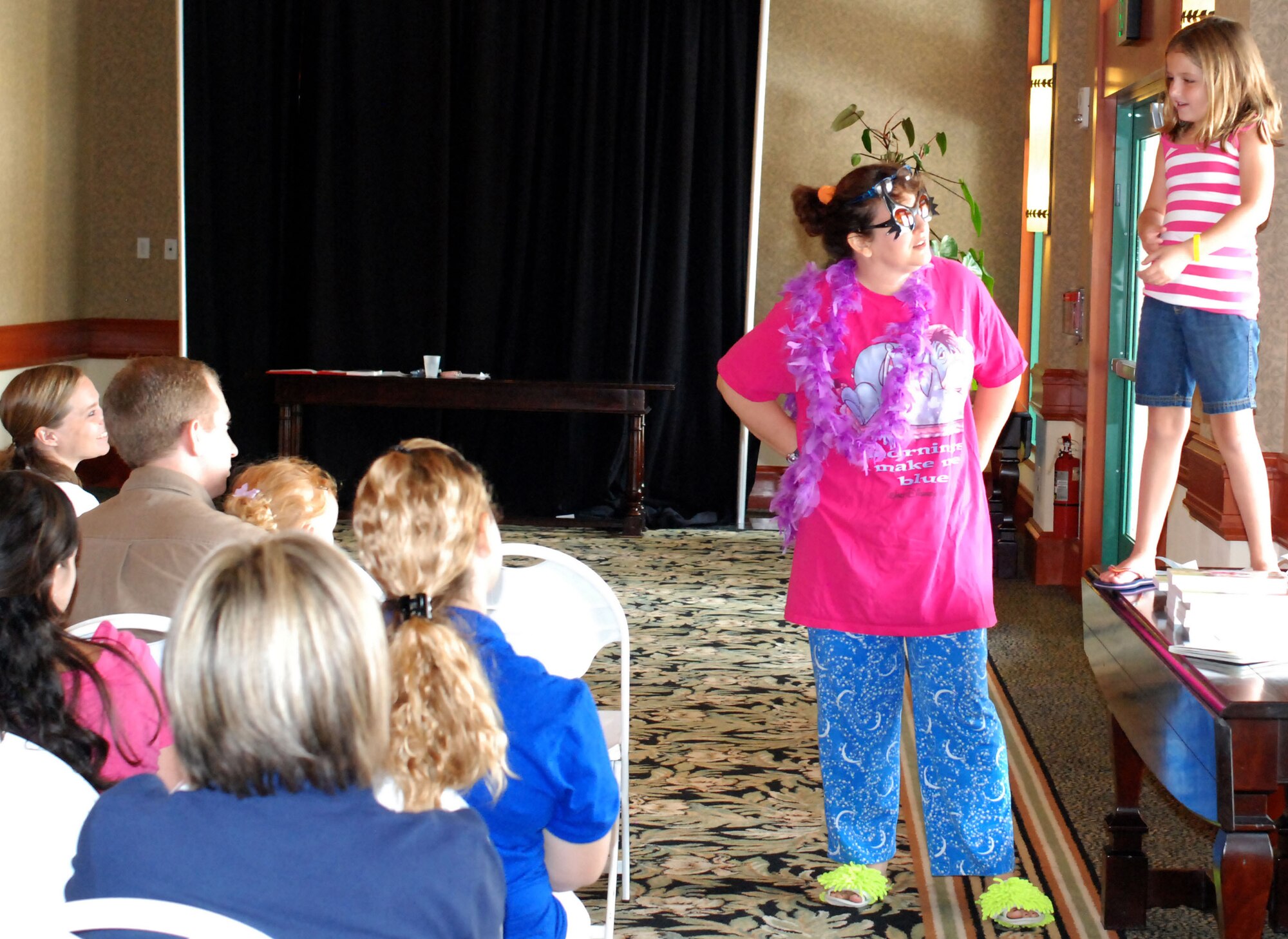 Orlando, Fla. - The "story lady" held a seminar here for recently deployed Air Force Reservists to give them tips on talking with their children about deployments. Approximately 550 Airmen and their families from four different Air Force bases throughout the country attended an Air Force Reserve sponsored Yellow Ribbon event at Shades of Green, an Armed Forces resort on Walt Disney World's complex. The program is designed to help reintegrate and educate Airmen and their families on the resources available to them pre and post deployment. (U.S. Air Force photo/Staff Sgt. Leslie Kraushaar)
