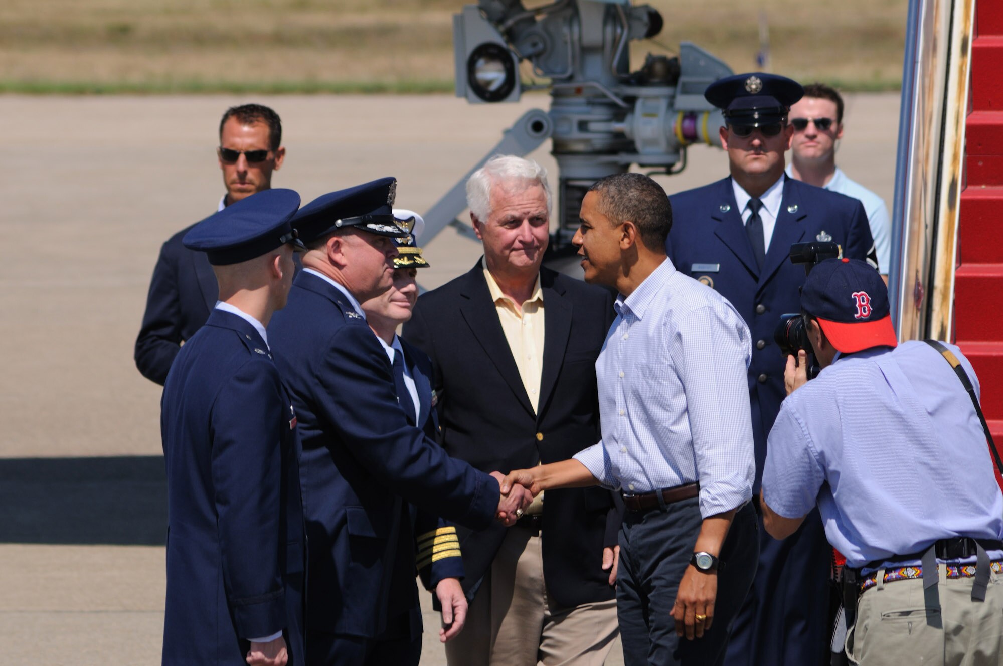 President Obama is greeted by congressman William Delahunt as he stops at Air Station Cape Cod on August 19th 2010.