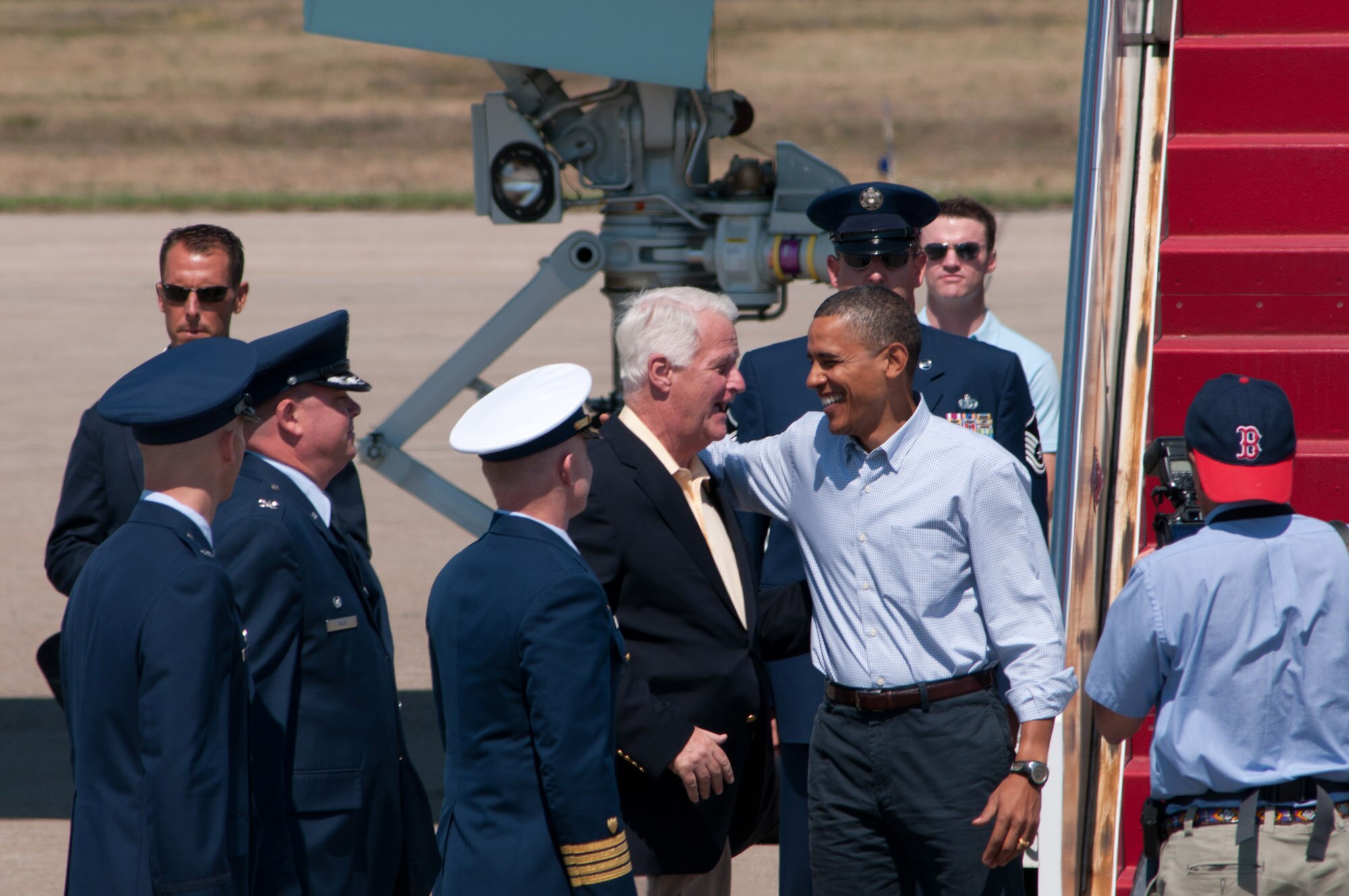 President Obama is greeted by congressman William Delahunt as he stops at Air Station Cape Cod on August 19th 2010.