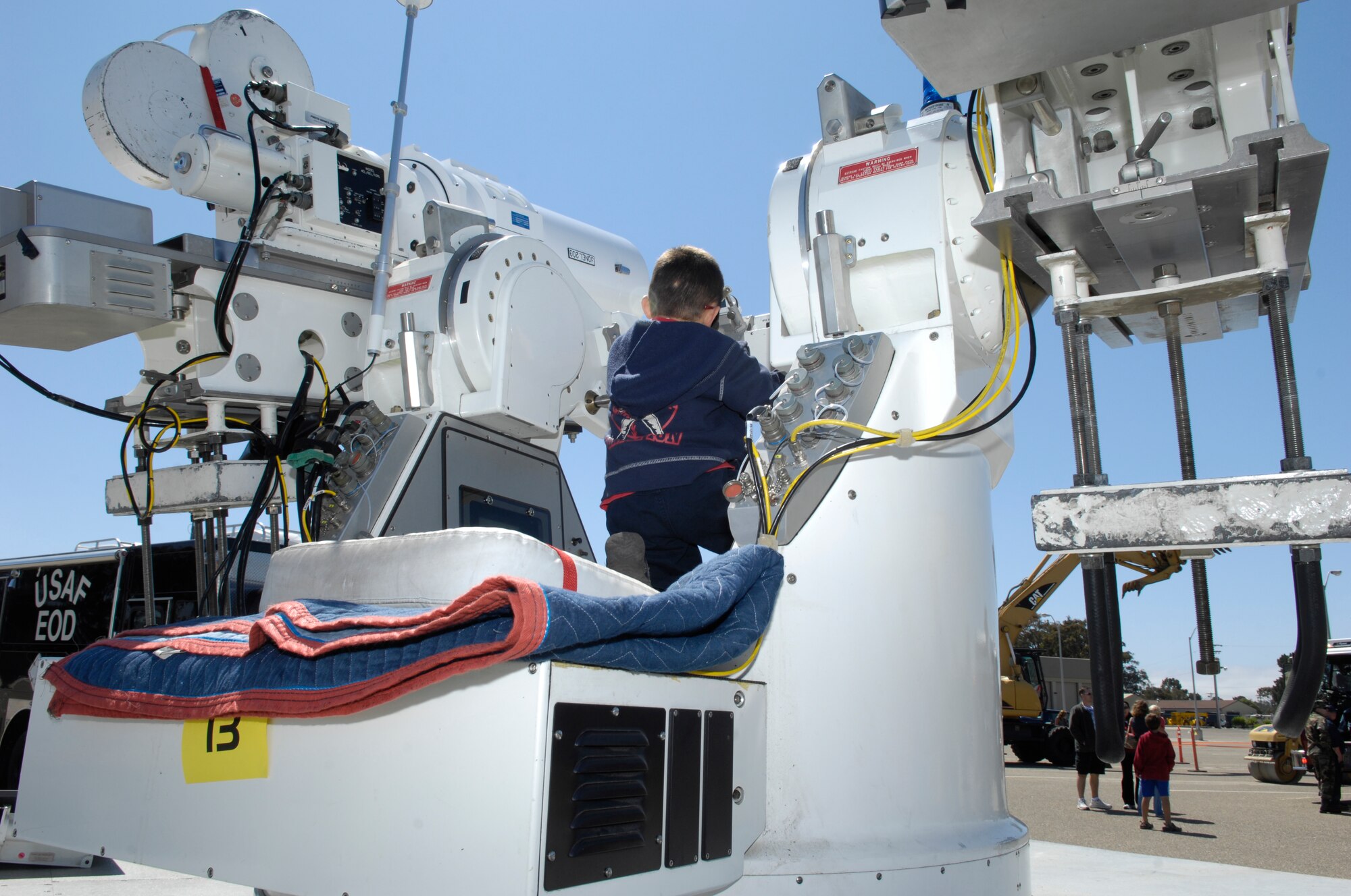 VANDENBERG AIR FORCE BASE, Calif. – Manning the tracking mount, Andrew Frey views the world through the telescope at this year’s Touch-a-Truck event here Saturday, Aug. 21, 2010. Hosted by the 30th Force Support Squadron, Touch-a-Truck is an event that enables children to learn and operated various equipment used on or around base. (U.S. Air Force photo/Airman 1st Class Lael Huss)
