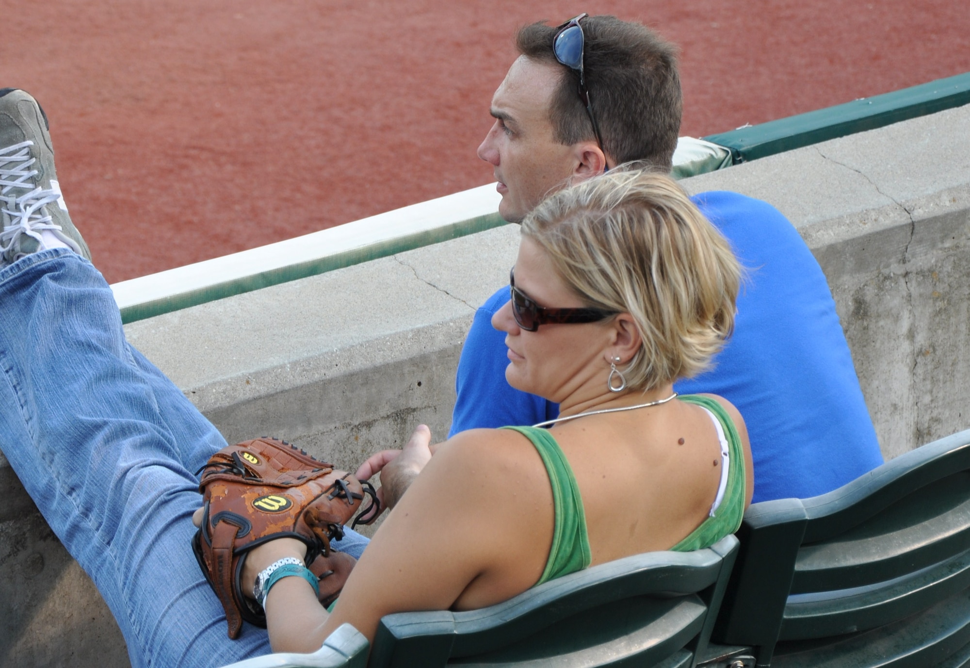 Master Sgt. Elizabeth Holzbaur, an auto flight instrument and navigation craftsman with the 315th Aircraft Maintenance Squadron, is game ready with her baseball glove during the military appreciation night baseball game Aug 19, 2010 at Joseph P. Riley, Jr. Park in Charleston, S.C. (U.S. Air Force photo/Staff Sgt. Shane Ellis)