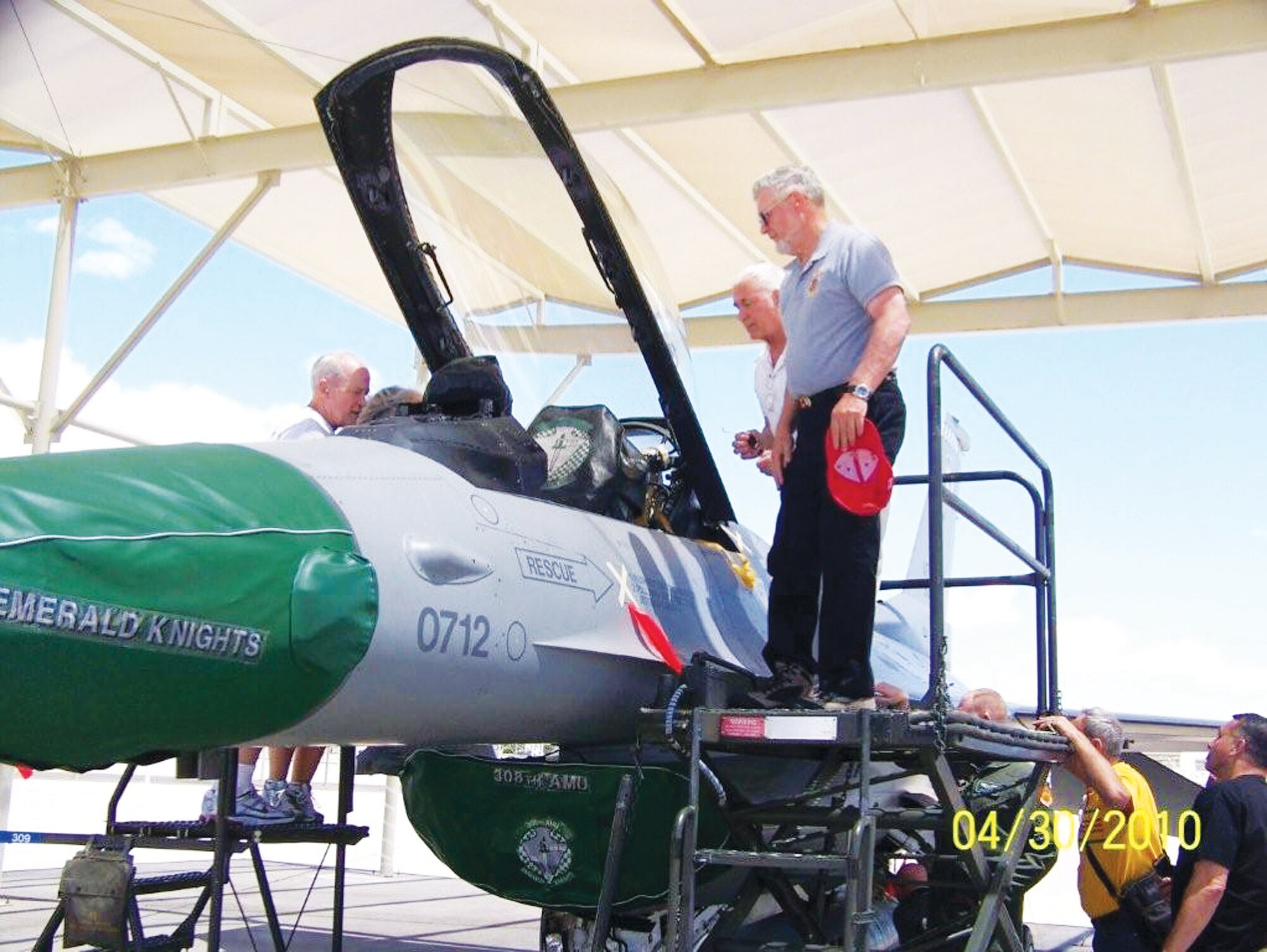 Former Marines with the 3rd Force Reconnaissance Company, a former special operations unit in Vietnam, get a close look at an F-16 Fighting Falcon earlier this year at Luke Air Force Base, Arizona.  Some Luke Airmen attended the group's gathering in Surprise to celebrate their 40th anniversary annual reunion, which included an awards presentation by Sen. John McCain, R-Ariz. (Courtesy photo)