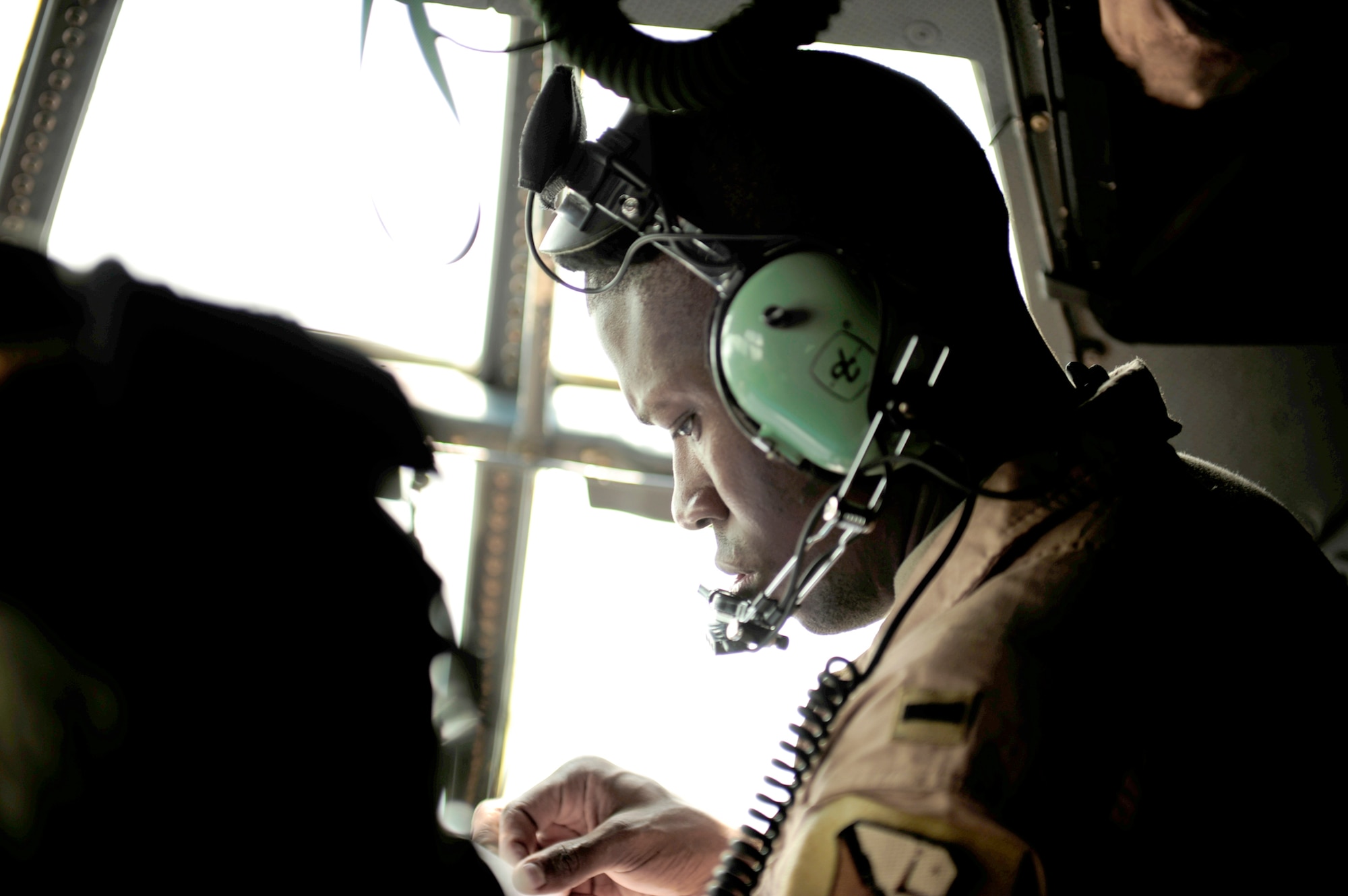 1st Lt. Jonathan Lipsey  looks over maps during flying mission in support of humanitarian relief efforts in Pakistan Aug. 20, 2010. Members of the 746th Expeditionary Airlift Squadron are conducting missions to Pakistan out of Bagram Airfield, Afghanistan. Lieutenent Lipsey is a C-130H Hercules navigator assigned to the 746th EAS. (U.S. Air Force photo/Staff Sgt. Andy M. Kin)