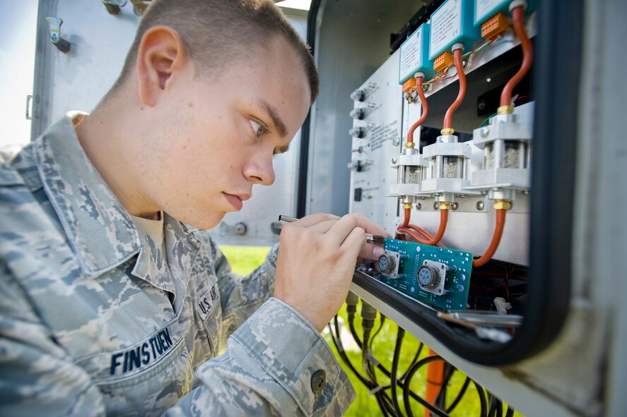 Senior Airman Kevin Finstuen conducts a corrosion control check on an automatic observation system on the flightline Aug. 17, 2010, at Misawa Air Base, Japan.  When performing maintenance on the weather system, Airman Finstuen checks for corrosion and any deterioration caused by the elements of nature.  Airman Finstuen is an airfield systems maintenance technician with 35th Communications Squadron. (U.S. Air Force photo/Senior Airman Jamal D. Sutter)