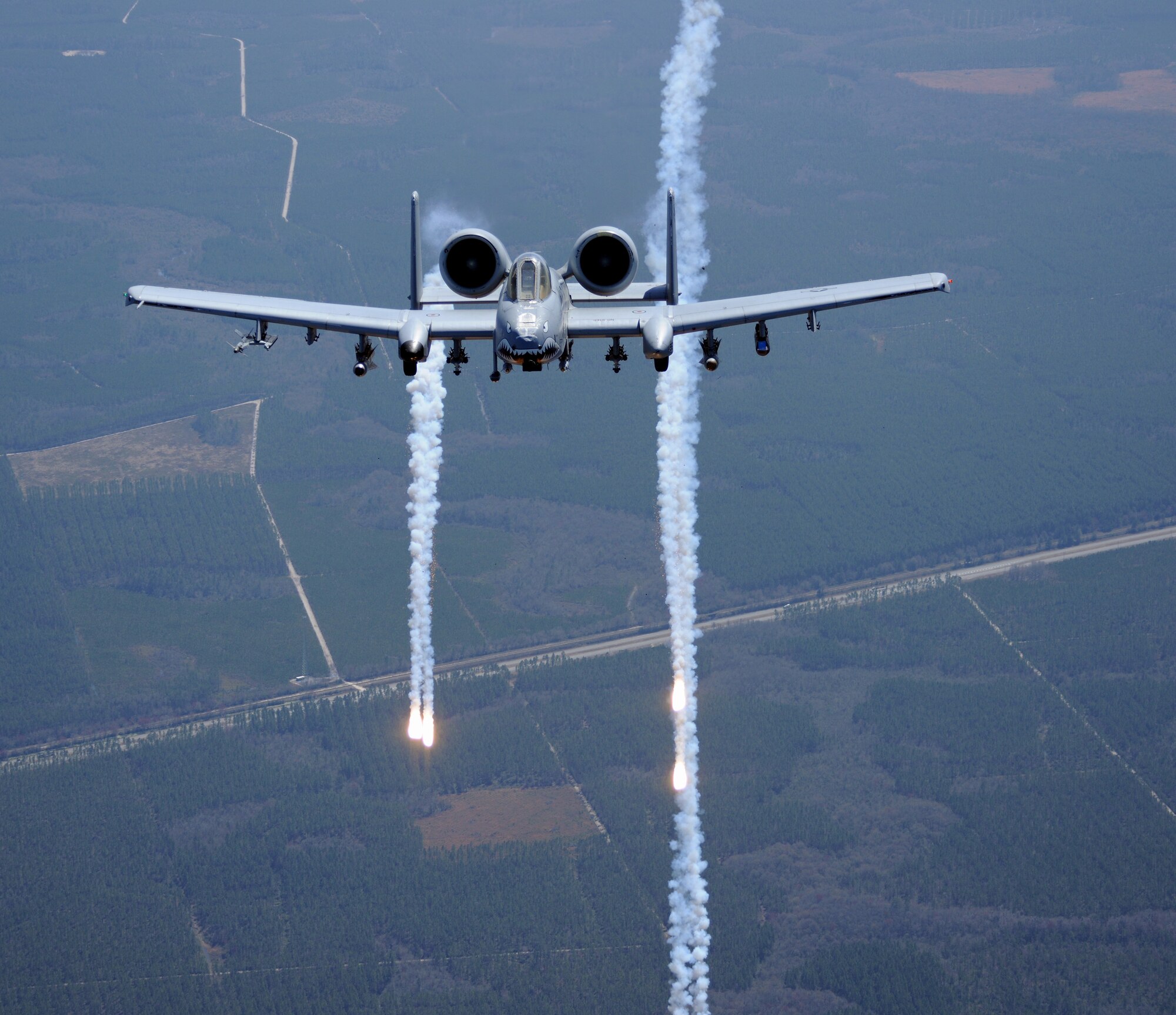 MOODY AIR FORCE BASE, Ga. -- An A-10C Thunderbolt II launches flares during a training exercise here March 16. The Grand Bay Bombing and Gunnery Range showcases a new moving target system that allows aircraft to fire at a more realistic object. (U.S. Air Force photo/Airman 1st Class Benjamin Wiseman)