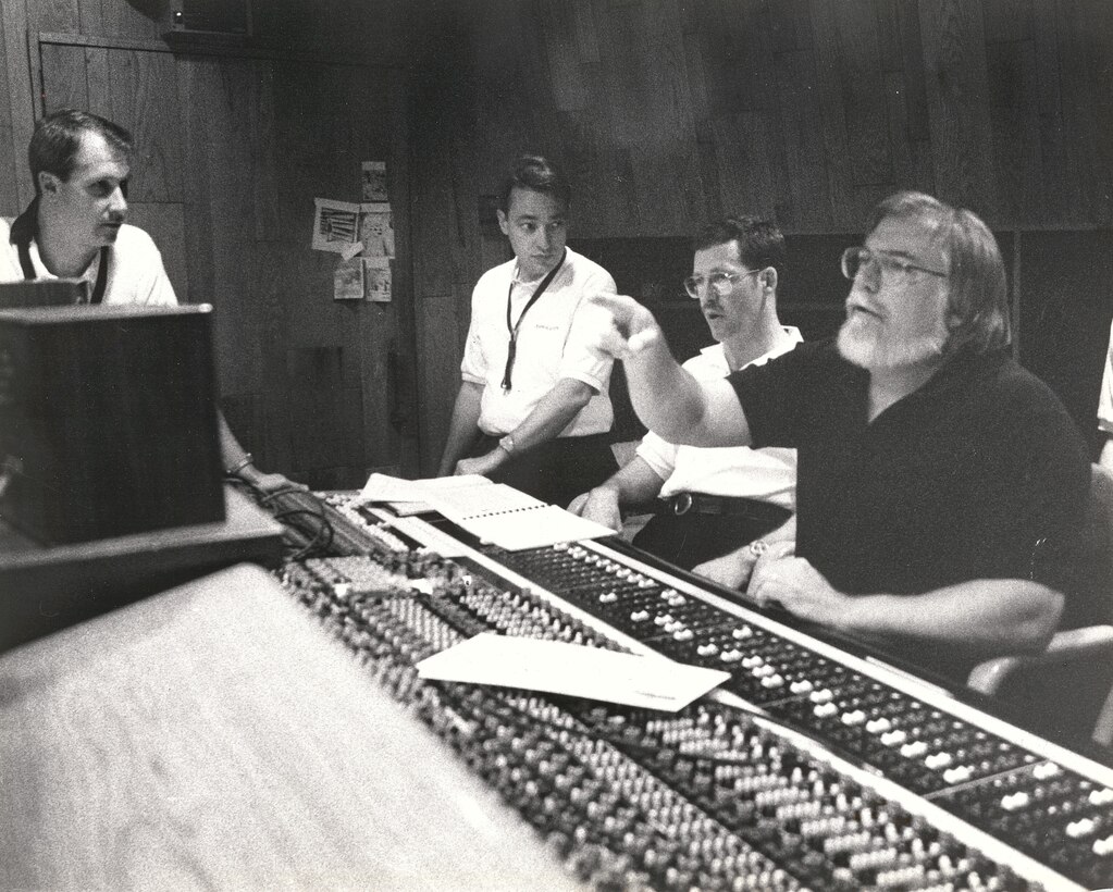 Airmen of Note members Pete BarenBregge and Joe Eckert with arranger Mike Crotty collaborate during a recording session with Bias studio engineer Bob Dawson.  If you have any further insight regarding this photo, please email our Band Historian <a href="mailto:usafbandhistorian@afncr.af.mil">Tech. Sgt. Tracey MacDonald</a>. Thank you and we look forward to hearing from you!  This is Photo 36. (Unknown Photographer)