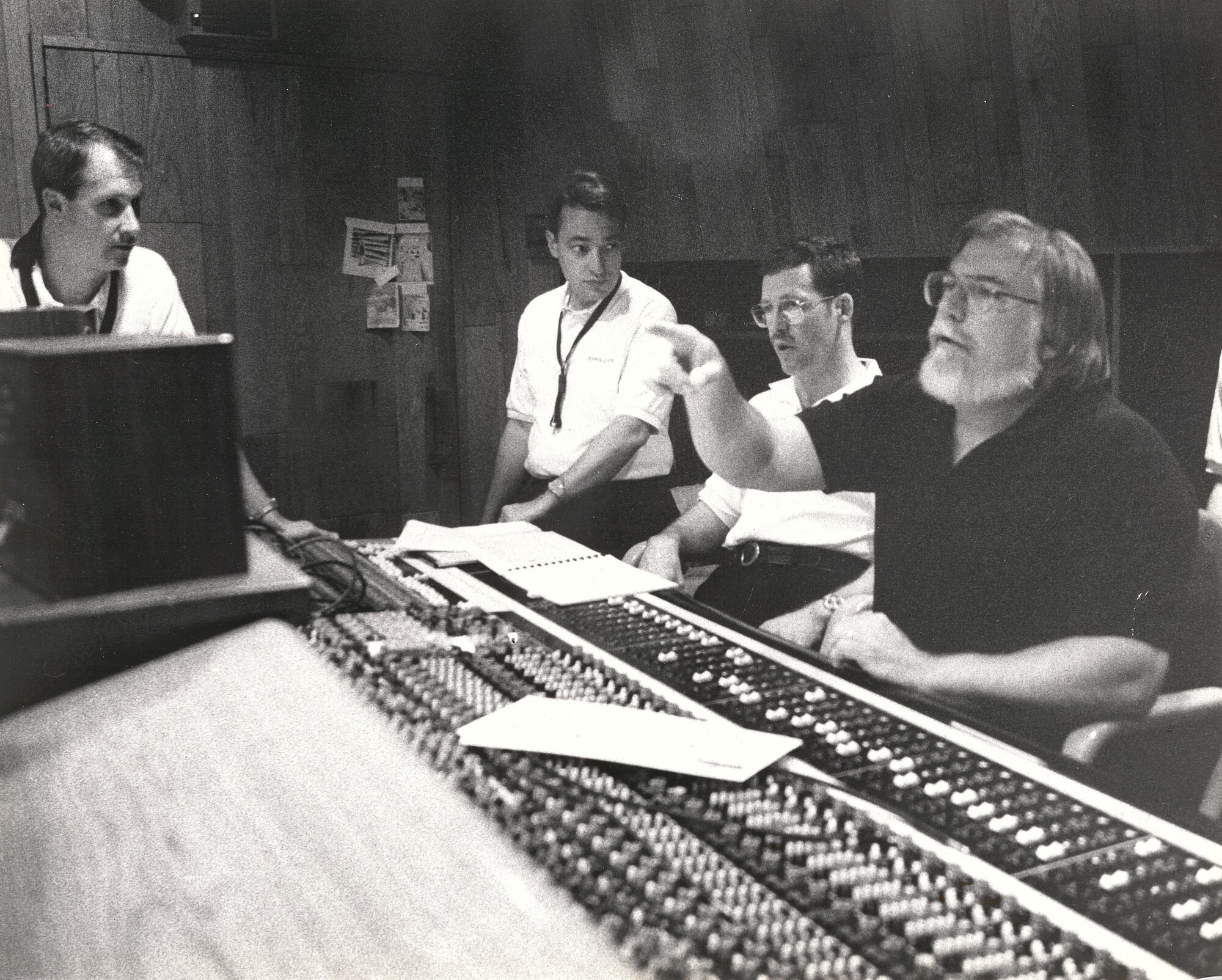 Airmen of Note members Pete BarenBregge and Joe Eckert with arranger Mike Crotty collaborate during a recording session with Bias studio engineer Bob Dawson.  If you have any further insight regarding this photo, please email our Band Historian <a href="mailto:usafbandhistorian@afncr.af.mil">Tech. Sgt. Tracey MacDonald</a>. Thank you and we look forward to hearing from you!  This is Photo 36. (Unknown Photographer)