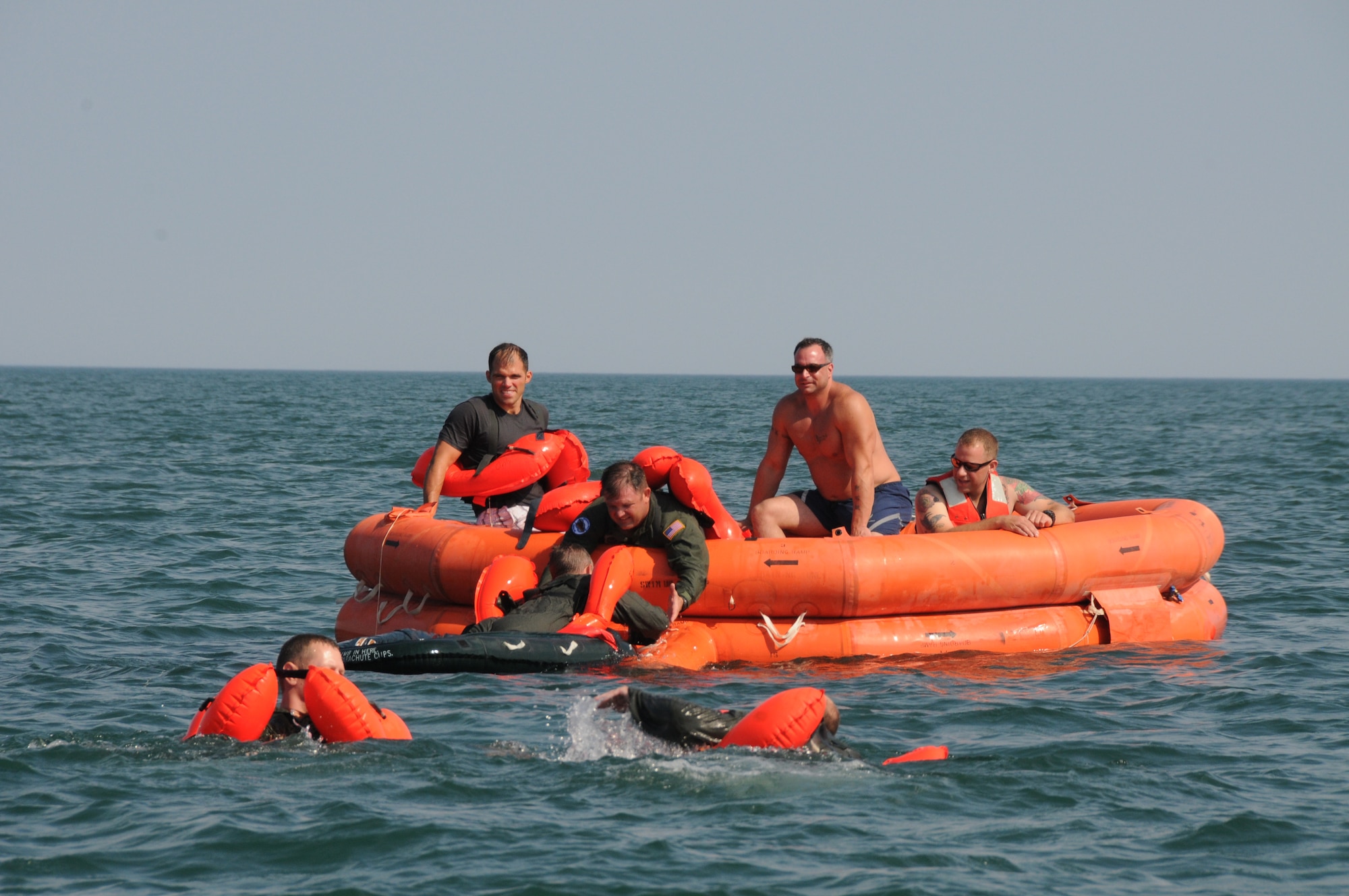 Members of the 136th Airlift Squadron spent the day on Lake Ontario taking part in a biannual training exercise that teaches aircrew water survival skills.  (U.S. Air Force photo/Senior Master Sgt. Derrick Harris)        