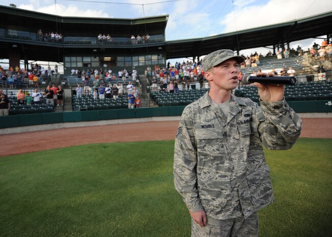 U.S. Air Force Staff Sgt. Timothy Womble sings the national anthem during the opening ceremony of the Charleston RiverDogs military appreciation night Aug. 19, 2010, at the Joseph P. Riley, Jr. Park in Charleston, S.C. Sergeant Womble gave the performance in front of nearly 4,900 fans who came out for the RiverDogs? second military appreciation night of the year. Sergeant Womble is an aerospace ground equipment mechanic with the 437th Maintenance Squadron. (U.S. Air Force photo/Senior Airman Timothy Taylor)