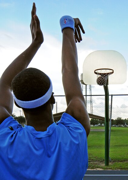 Capt. Antoine Hood, 919th Special Operations Wing, sinks a free throw at the Duke Field court.  Captain Hood had a celebrated college basketball career at the Air Force Academy from 2002-2006, but has yet to realize his dream of playing in the NBA.  With his active-duty commitment now complete, the reservist says he’s ready to take the next step and make that dream a reality.  (U.S. Air Force photo/Tech. Sgt, Samuel King Jr.)