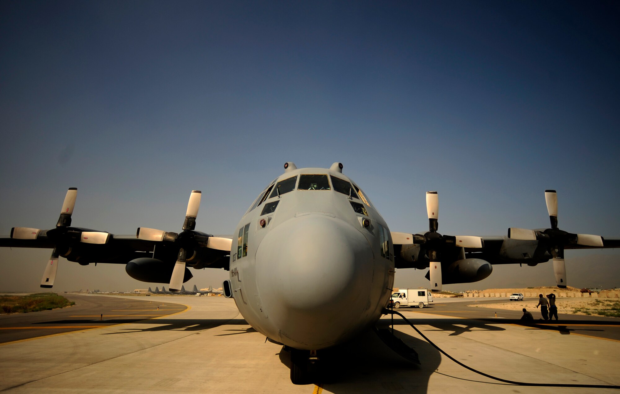 U.S. Air Force C-130H Hercules aircraft from the 746th Expeditionary Airlift Squadron, sits on the flight line during pre-flight inspections prior to flying mission in support of humanitarian relief efforts in Pakistan at Bagram Airfield, Afghanistan, Aug. 20, 2010. (U.S. Air Force photo by Staff Sgt. Andy M. Kin/Released)
