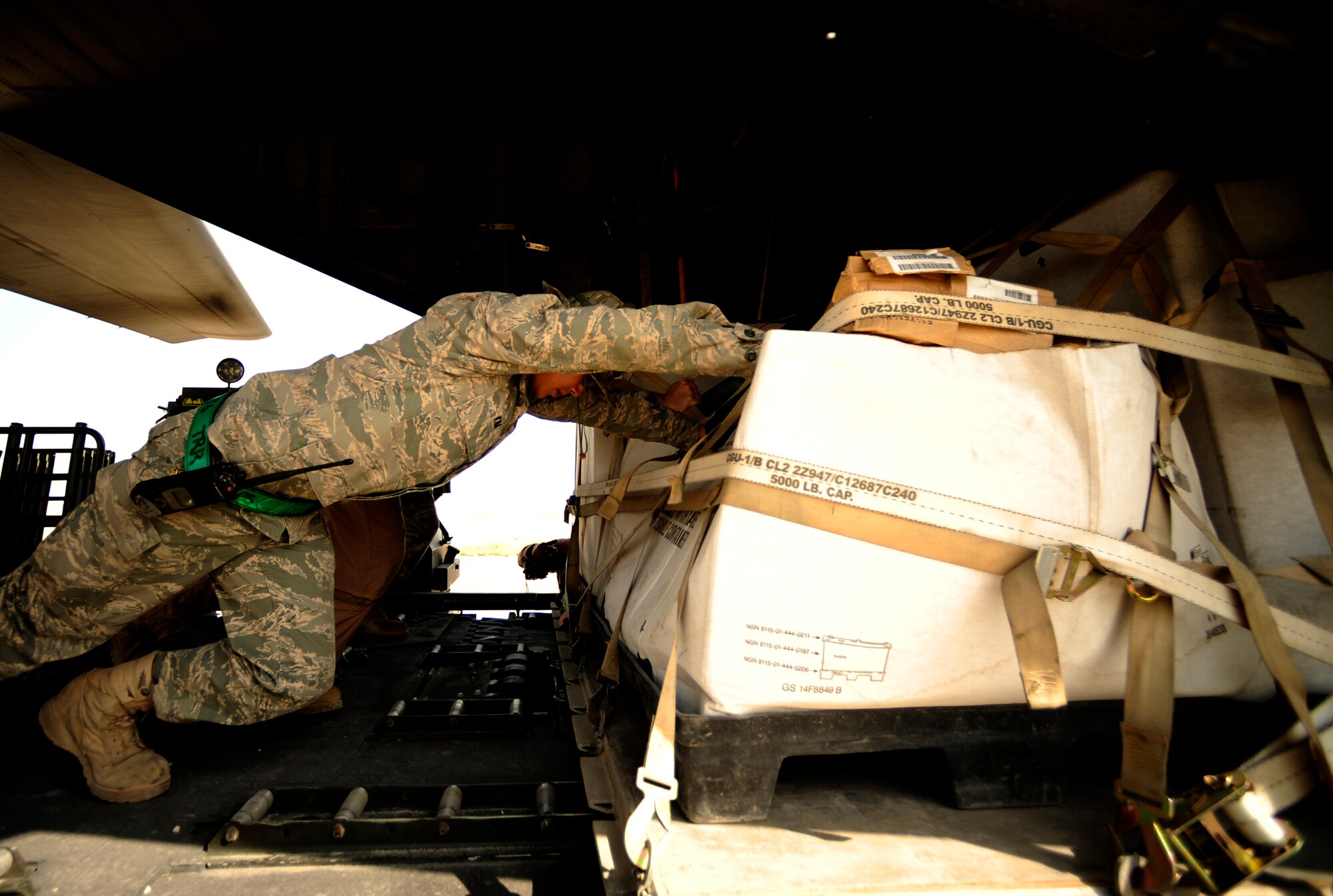 U.S. Air Force Airmen from the 746th Expeditionary Airlift Squadron, load aid and supplies onto a C-130H Hercules aircraft in support of humanitarian relief efforts in Pakistan at Bagram Airfield, Afghanistan, Aug. 20, 2010. (U.S. Air Force photo by Staff Sgt. Andy M. Kin/Released)