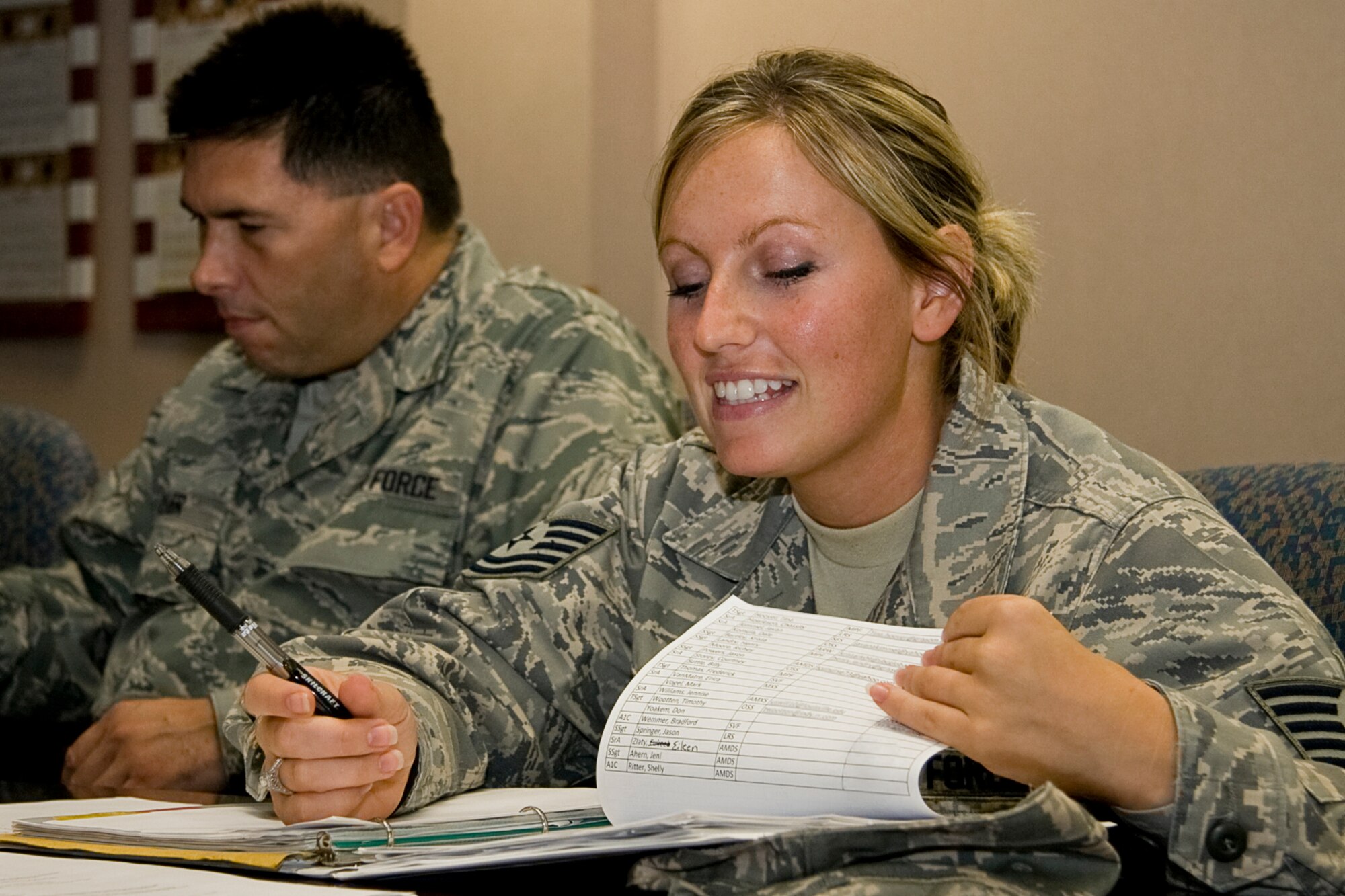 GRISSOM AIR RESERVE BASE, Ind. -- Tech. Sgt. Jonna Sullivan, Grissom Rising Six treasurer, briefs other Rising Six members on financial matters during a meeting Aug. 8. The Rising Six is an organization for Grissom Airmen from the ranks of airman basic through technical sergeant. The mission of the organization is to establish and maintain a spirit of comradeship and esprit de corps that will enhance the prestige of all Airmen, encourage an attitude of unified purpose and set an example for all enlisted personnel according to the standards, traditions and customs of the U.S. Air Force. (U.S. Air Force photo/Tech. Sgt. Mark R. W. Orders-Woempner)