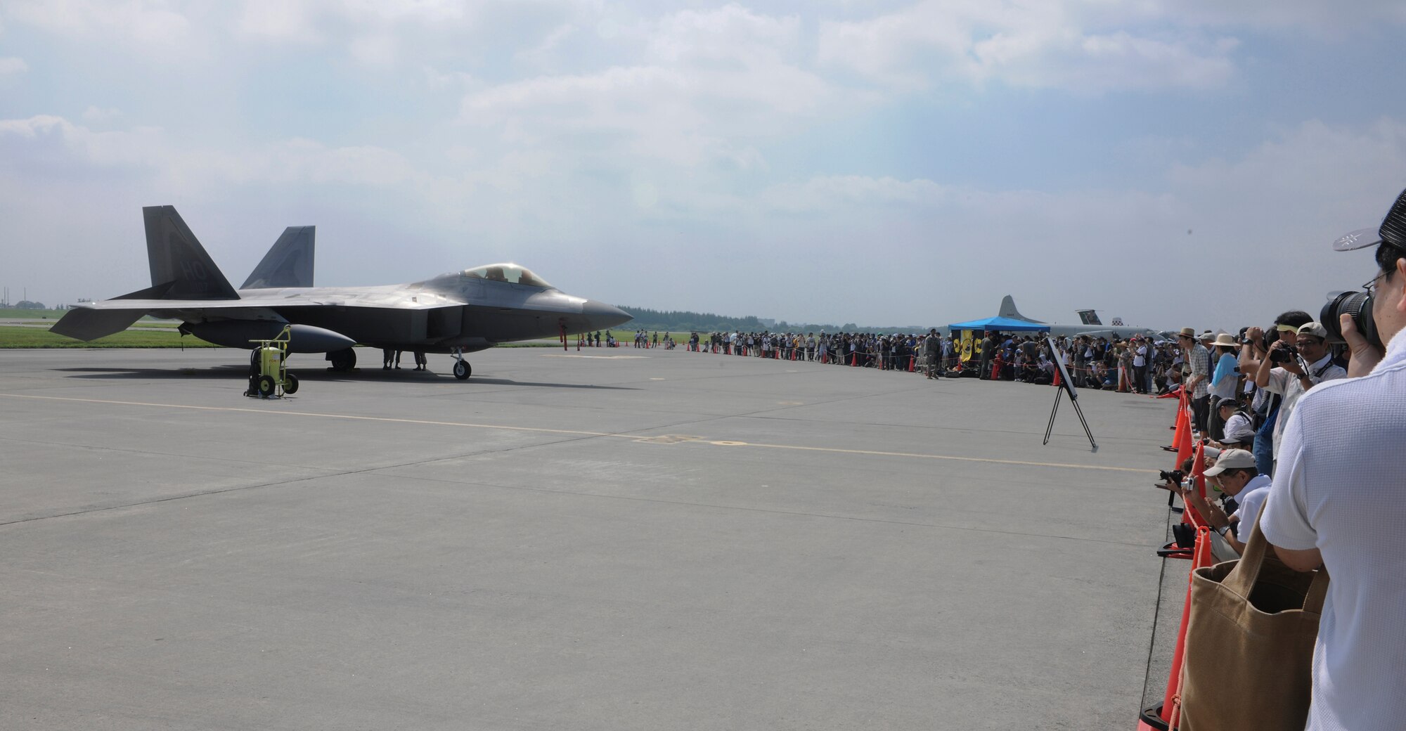 YOKOTA AIR BASE, Japan -- An F-22 Raptor from the 7th Fighter Squadron, Holloman Air Force Base, New Mexico, currently deployed to Kadena Air Base, was one of the attractions that brought more than 130,000 people to the two-day 2010 Yokota Air Base Japanese-American Friendship Festival, Aug. 21-22. (U.S. Air Force photo by Staff Sgt Stacy Moless)
