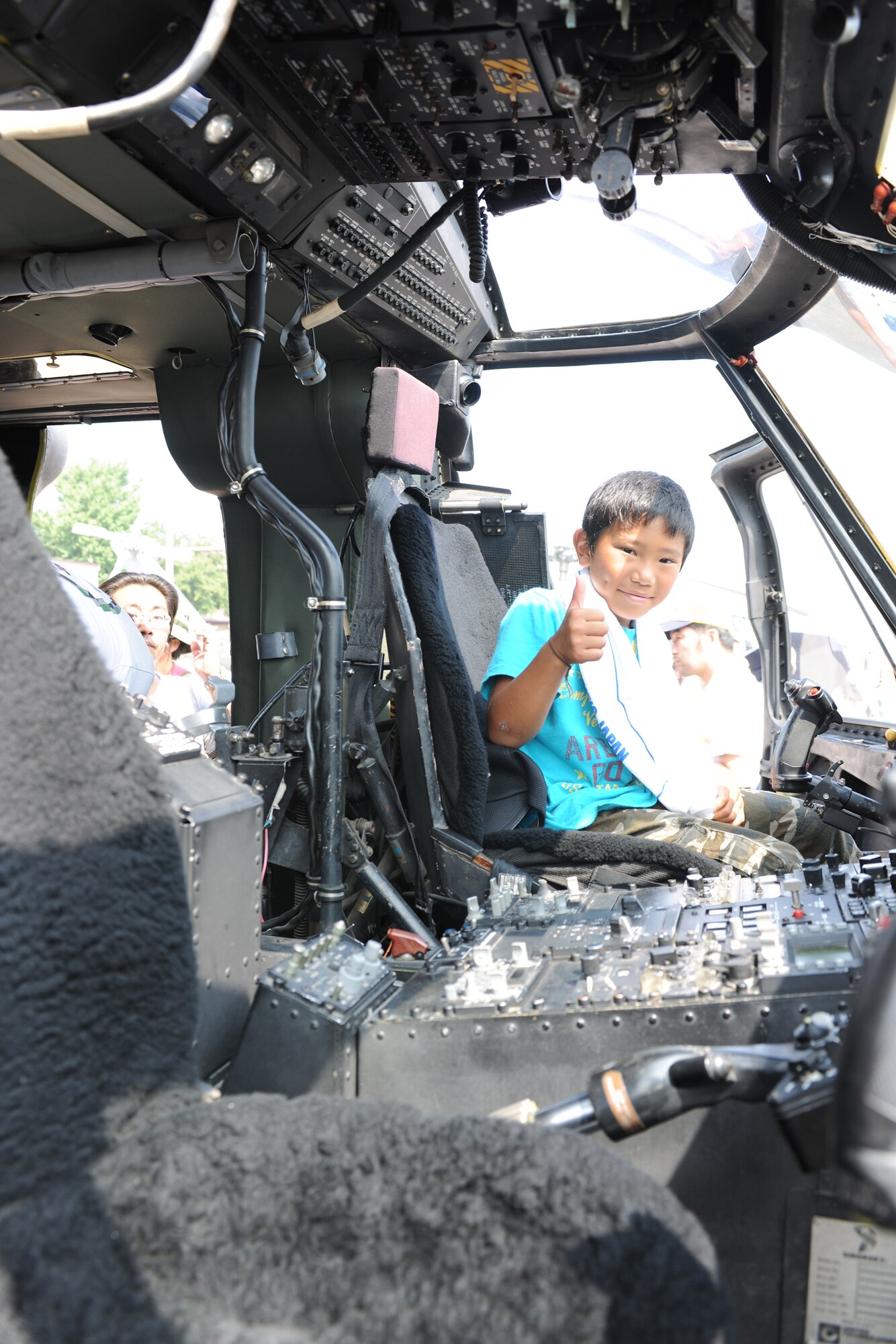 YOKOTA AIR BASE, Japan -- With 42 different aircraft on display, including this UH-1 helicopter, children and parents alike were able to enjoy a glimpse of the base and interact with the Yokota community. Yokota Air Base held its annual Japanese-American Friendship Festival Aug. 21-22. (U.S. Air Force photo by Staff Sgt Stacy Moless)
