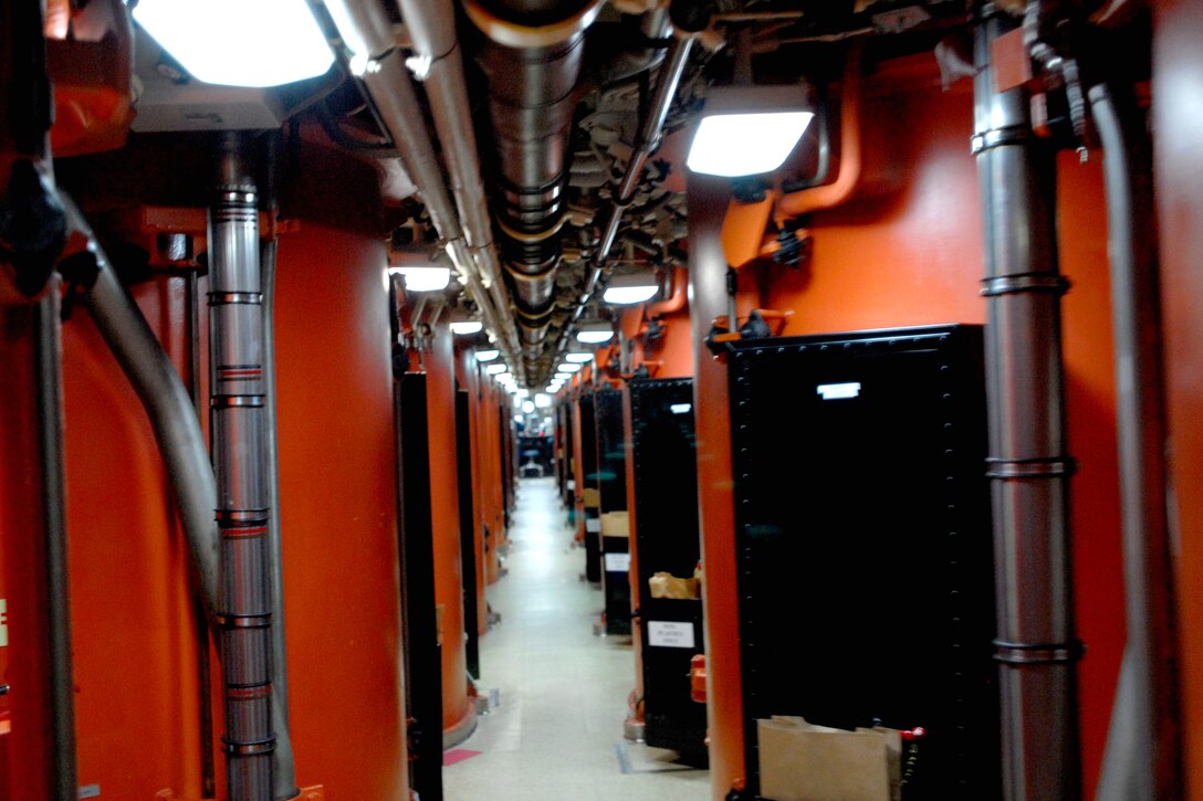 Twenty-four orange tubes hold the Trident nuclear missiles aboard the USS Rhode Island in the Atlantic Ocean, Aug. 16, 2010. The missiles are the focal point of the USS Rhode Island and 13 other U.S. Ohio-class ballistic missile submarines.