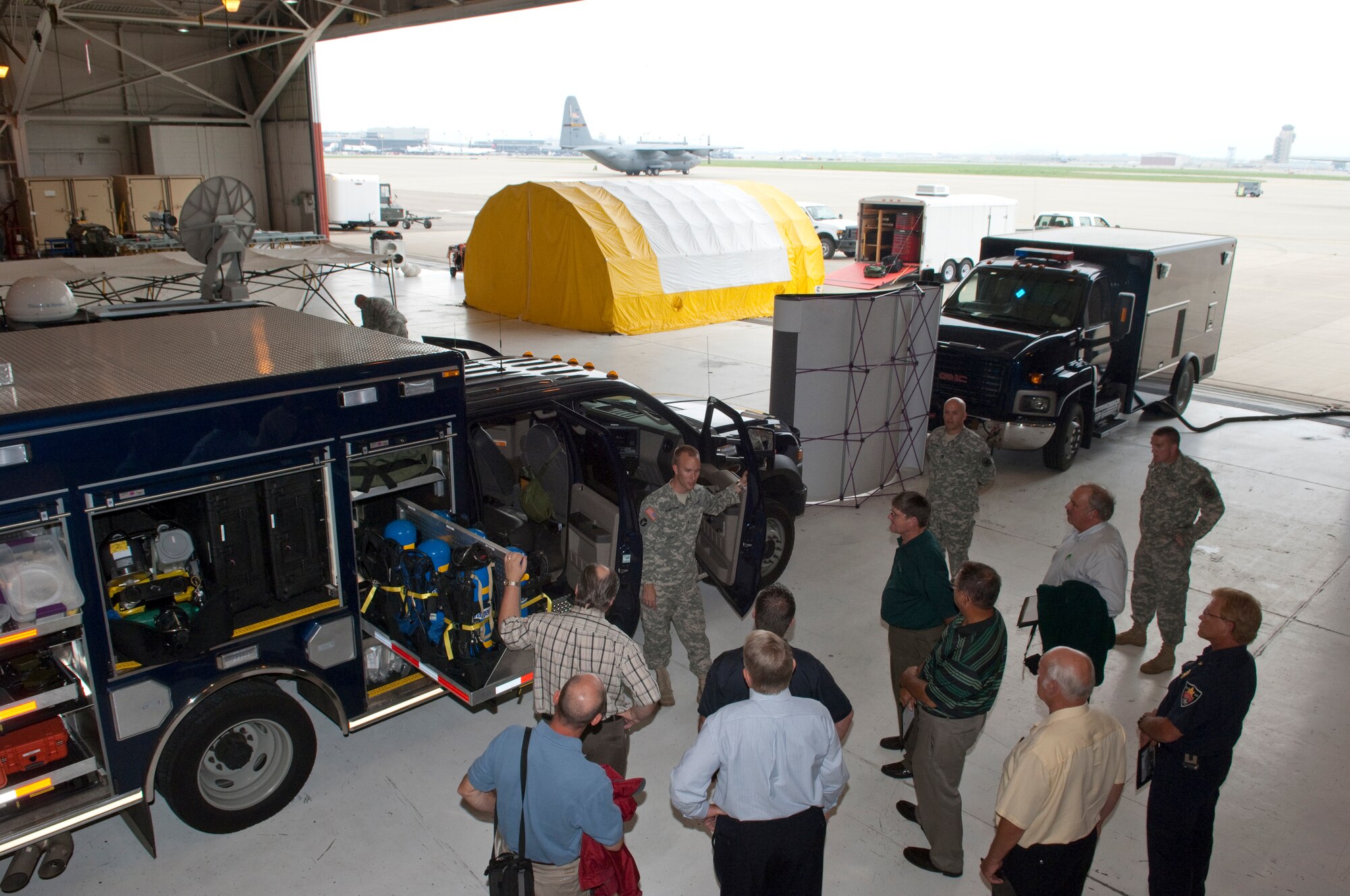 Mayors and other city officials from around the Twin Cities participated in demonstrations, an orientation flight on a C-130, and exchanged information with Minnesota National Guard members at Metro Mayors Day at the 133rd Airlfit Wing on Aug. 19, 2010. USAF official photo by Senior Master Sgt. Mark Moss