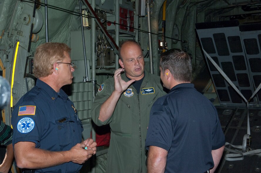 Metropolitan Twin Cities civilian officials talk with an Airman aboard a C-130 "Hercules" as they participate in Metro Mayors Day at the 133rd Airlift Wing on August 19, 2010. The Minnesota National Guard units at the Minneapolis-St. Paul International Airport brought local officials on base and on a flight on a military cargo aircraft to demonstrate the capabilities that could be available once authorized for communities. USAF Official Photo by Senior Master Sgt. Mark Moss