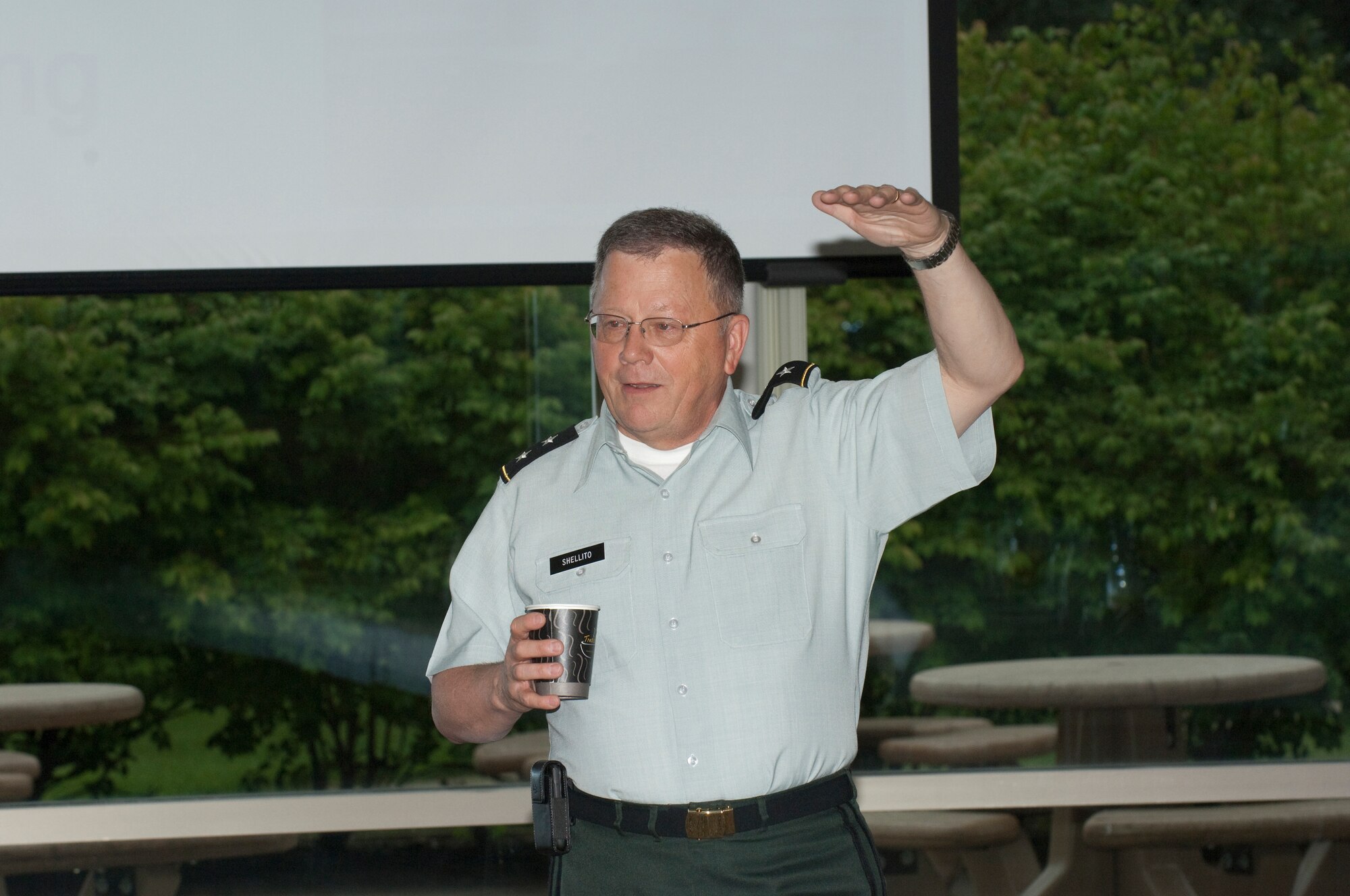 Officials from municipalities around the Minneapolis-St. Paul metro are briefed by Major General Larry Shellito, Adjutant General of the Minnesota National Guard, during Metro Mayors Day at the 133rd Airlift Wing on August 19, 2010. The Minnesota National Guard units at the Minneapolis-St. Paul International Airport brought local officials on base and on a flight on a military cargo aircraft to demonstrate the capabilities that could be available once authorized for communities. USAF Official Photo by Senior Master Sgt. Mark Moss
