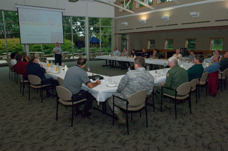 Officials from municipalities around the Minneapolis-St. Paul metro are briefed by Major General Larry Shellito, Adjutant General of the Minnesota National Guard, during Metro Mayors Day at the 133rd Airlift Wing on August 19, 2010. The Minnesota National Guard units at the Minneapolis-St. Paul International Airport brought local officials on base and on a flight on a military cargo aircraft to demonstrate the capabilities that could be available once authorized for communities. USAF Official Photo by Senior Master Sgt. Mark Moss