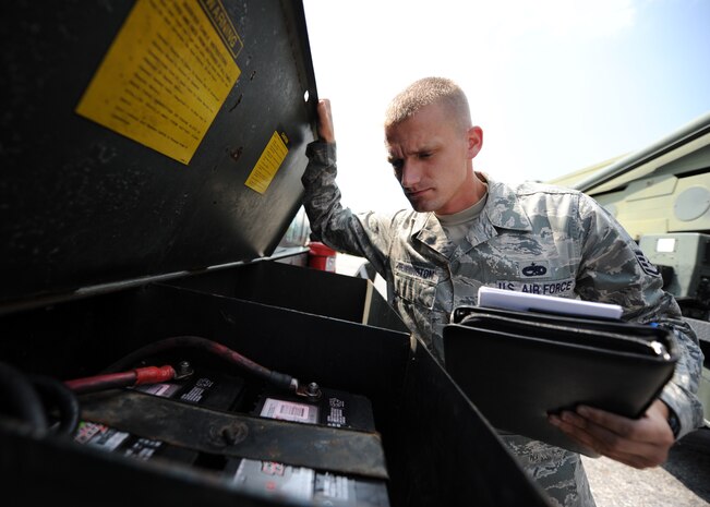 U.S. Air Force Staff Sgt. Robert Pennington performs a special inspection on a 7.5 ton flightline crane Aug. 24, 2010, on Joint Base Charleston, S.C. Periodic inspections are performed as part of the quality assurance program to ensure safety and compliance regulations are met and that vehicles are safe to operate. Sergeant Pennington is a quality insurance inspector with the 437th Maintenance Group. (U.S. Air Force photo/Senior Airman Timothy Taylor)