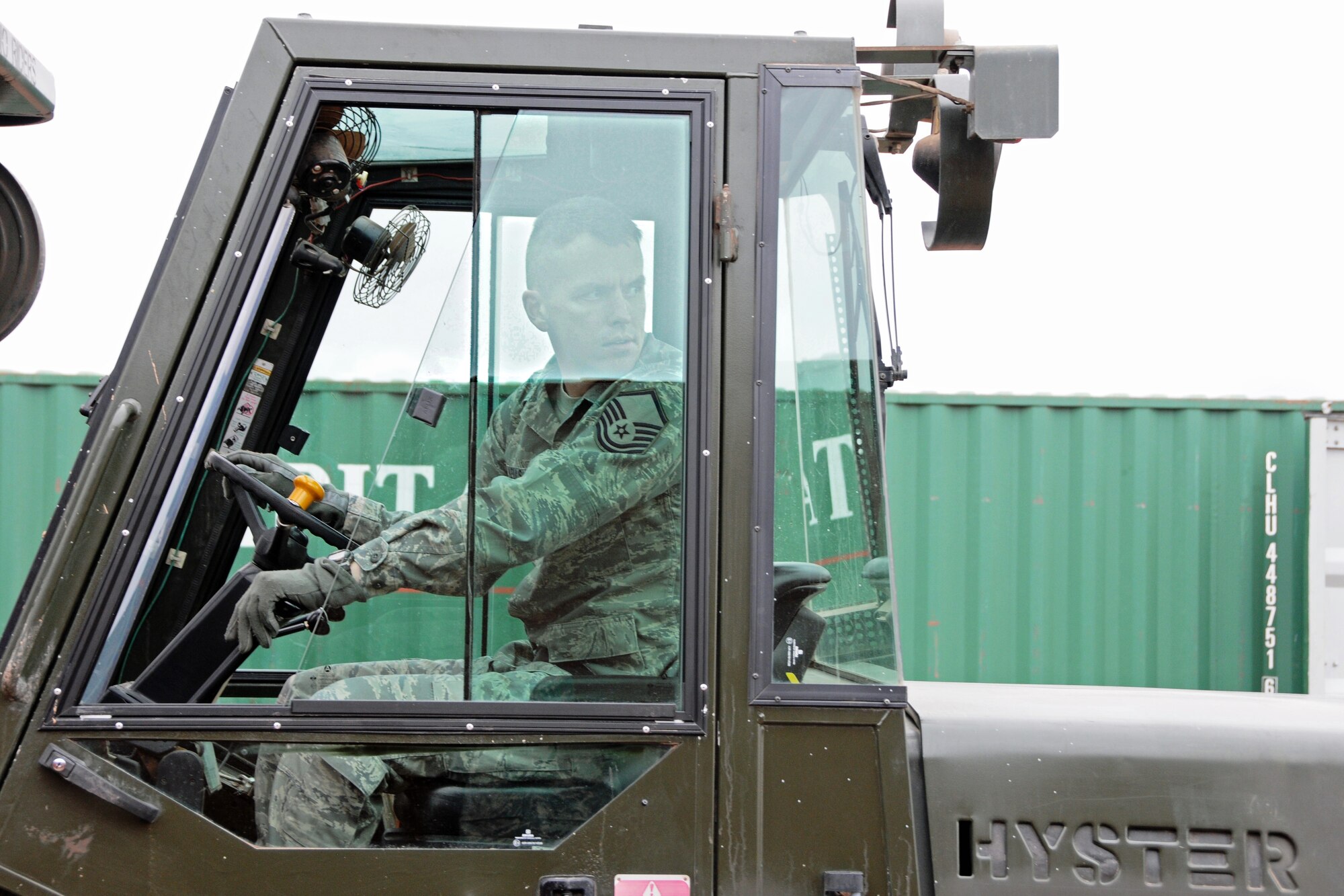 THULE AIR BASE, Greenland -- Master Sgt. Michal Wells, 821st Support Squadron, provides forklift support for storing lodging furniture as part of Operation PACER GOOSE, an annual summertime resupply mission to Thule Air Base. The base is the U.S. military’s northernmost installation, 750 miles north of the Arctic Circle. In July, a Military Sealift Command cargo ship named the American Tern, delivered more than 1.6 million pounds of cargo and a Navy fuel tanker delivered more than 8.2 million gallons of fuel. The cargo received this year will update the furnishings for the lodging facility and also serves as an avenue for delivery of items too large for the regular rotations of aircraft that fly in weekly. The resupply allows the base to operate during its austere winters, when it experiences complete darkness for months and temperatures dip to 30 degrees below zero. (U.S. Air Force photo)