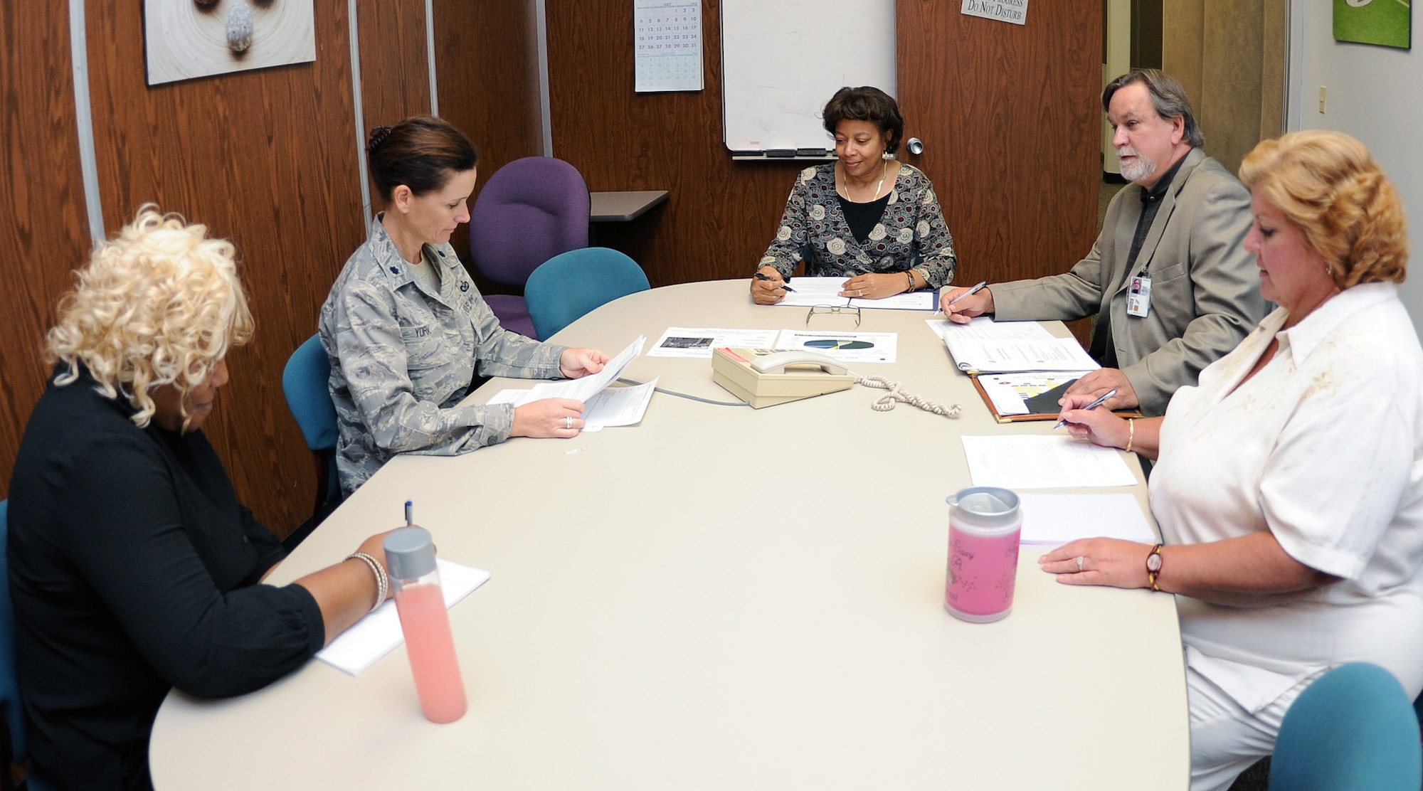 ARPC officials participate in the Bloggers Roundtable, a communications initiative from the Department of Defense's Emerging Media Directorate. During the roundtable teleconference, officials from ARPC's Directorate of Records Quality Management discussed the Center's efforts to convert the paper and microfiche records of thousands of Guardsmen and Reserve Airmen to electronic images and files. (Photo by Kevin Bell)
