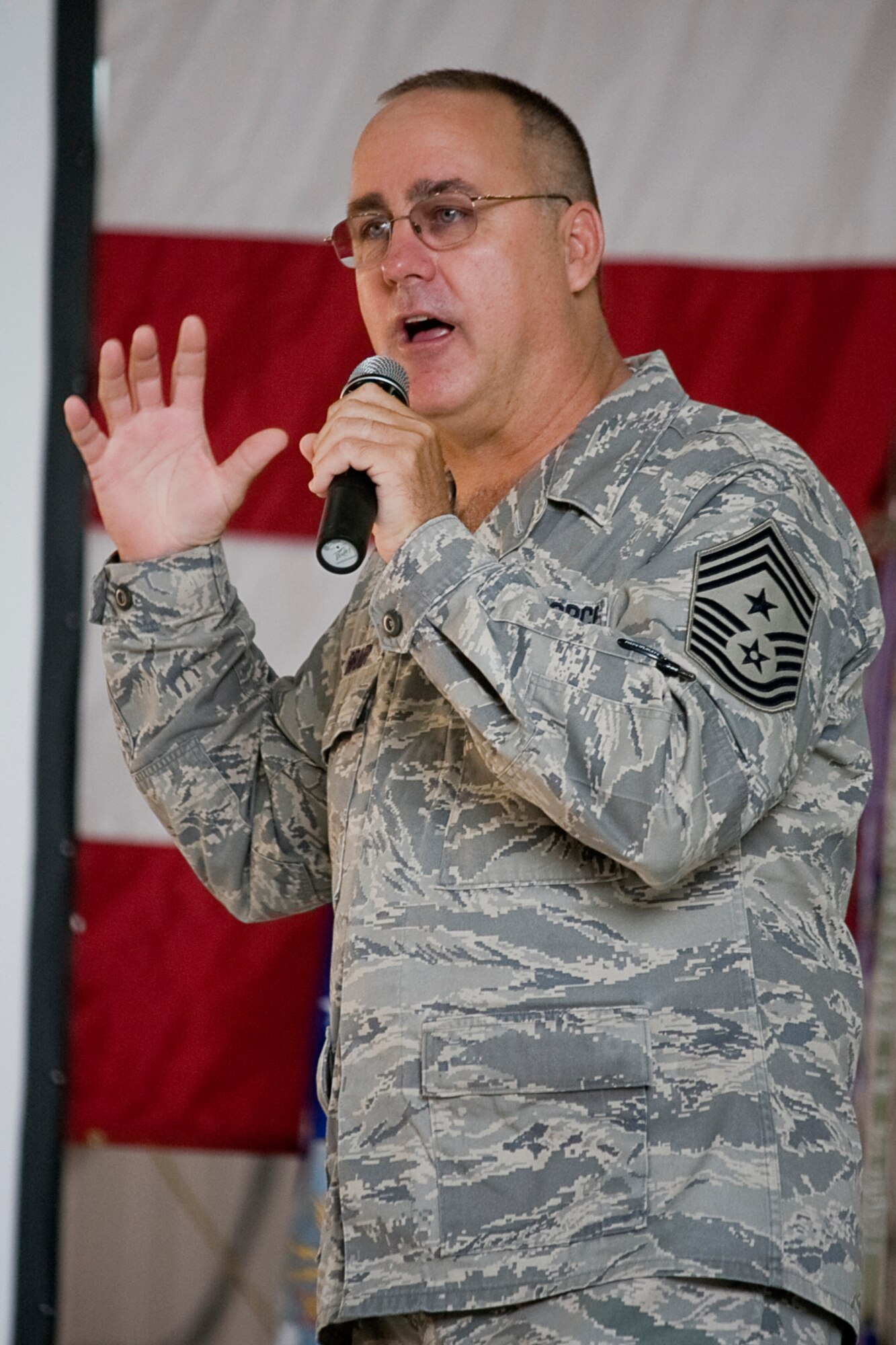 GRISSOM AIR RESERVE BASE, Ind. -- Chief Master Sgt. Larry Brady, 434th Air Refueling Wing command chief, speaks to members of the 434th ARW about how leadership relates to peanut butter sandwiches during a recent commander's call. Chief Brady also encouraged Airmen with their bachelor's degrees to consider pursuing a career as an Air Force officer through a Deserving Airman program here. (U.S. Air Force photo/Tech. Sgt. Mark R. W. Orders-Woempner)