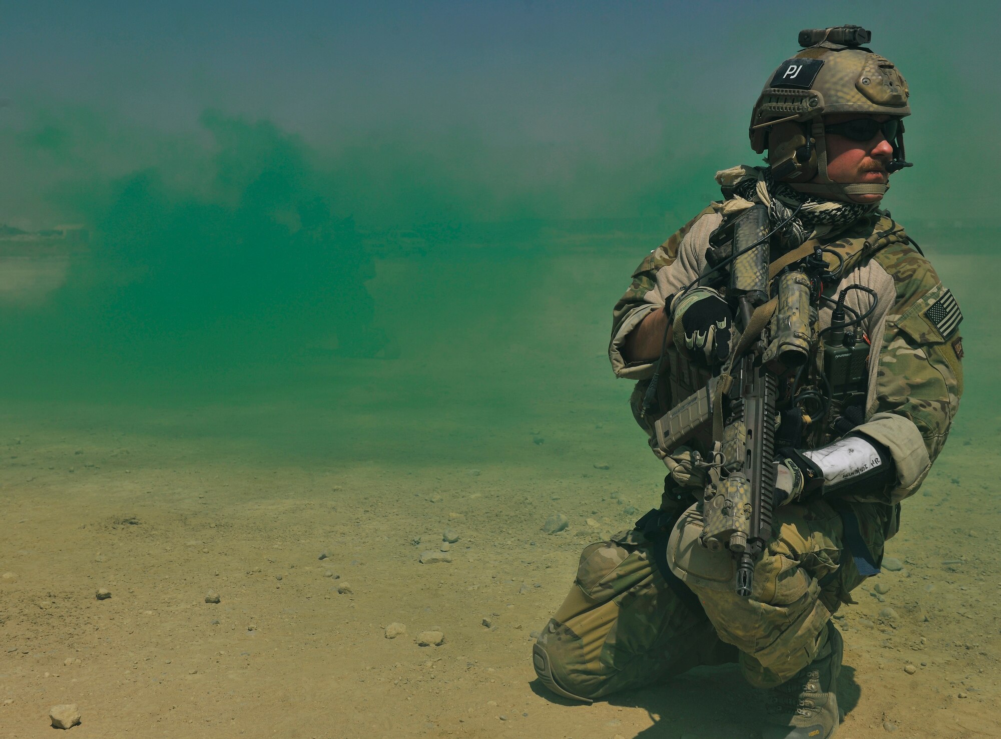 A pararescueman secures a sector of the landing zone before assisting simulated injured personnel during an exercise at Bagram Airfield, Afghanistan, Aug. 21. 2010. The exercise tested the rescue squadron?s ability to provide medical aid to U.S. and Coalition forces. (U.S. Air Force photo/Staff Sgt. Christopher Boitz)