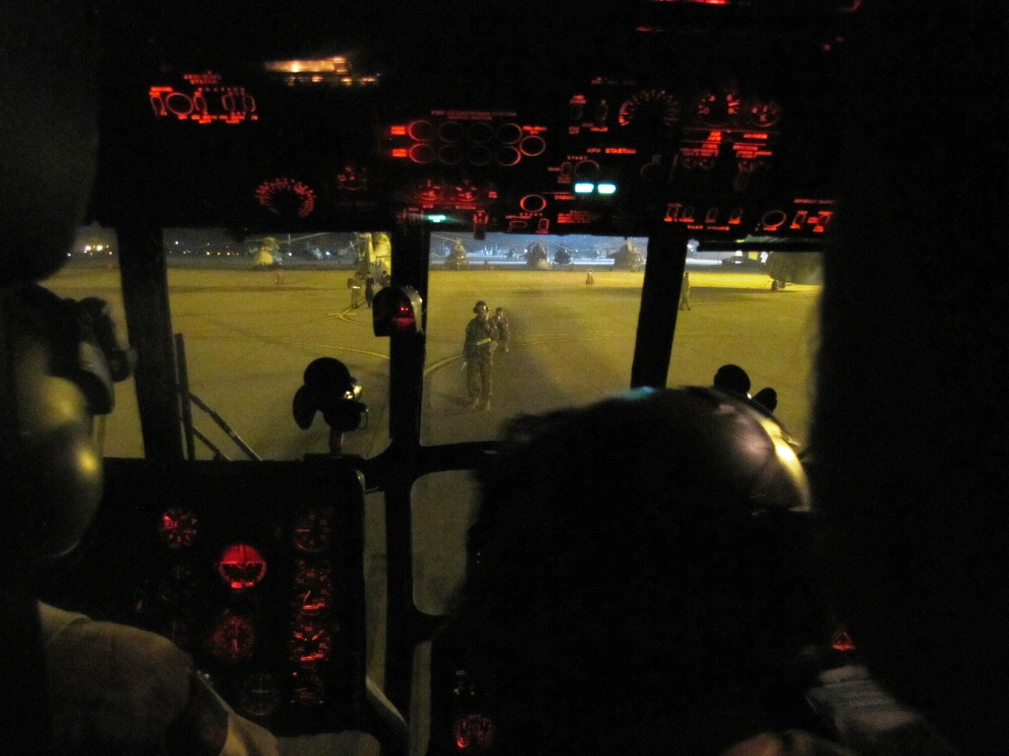 KABUL, Afghanistan - Afghan Air Force pilot flies with the aid of night vision goggles for the first time in Afghanistan in the Mi-17 Transport helicopter on Aug. 22, 2010. (U.S. Air Force photo by Capt. Rob Leese/RELEASED).