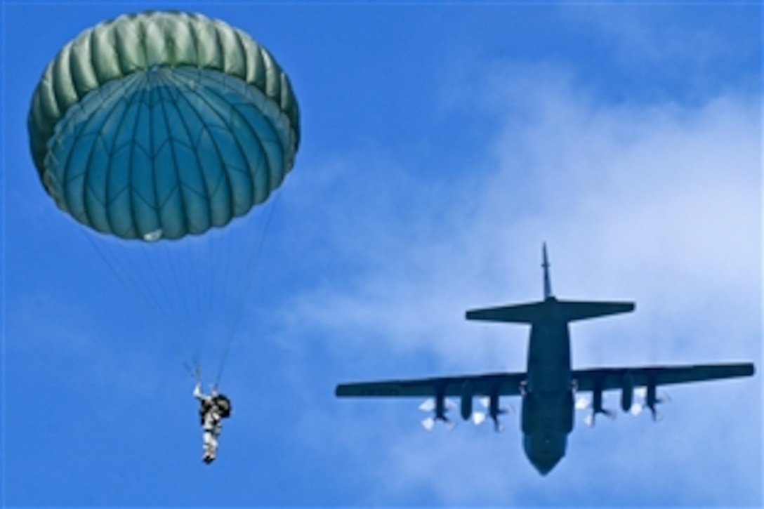 A U.S. Army soldier performs a parachute drop from a C-130 Hercules aircraft over the Klute Drop Zone in Beach Hill, W.Va., during a demonstration for family members and the public, Aug. 19, 2010. The soldier is assigned to the 82nd Airborne Division and the C-130 crew is assigned to the 130th Airlift Wing.