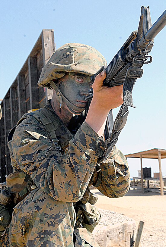 Recruit Robert J. Nystrom, Platoon 3236, Company K, posts security at 12 Stall, an obstacle in the Crucible, Aug. 24, at Weapons Field Training Battalion, Marine Corps Base Camp Pendleton, Calif. Nystrom, a Troutdale, Ore., native, always had high expectations for himself.