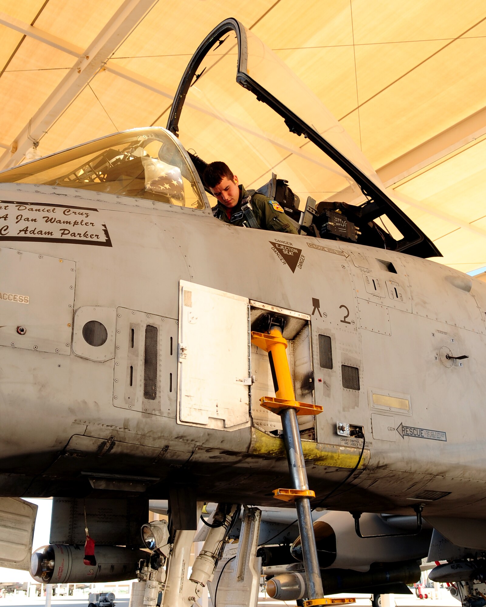 1st Lt. Dan Griffin, a 358th Fighter Squadron pilot, checks his aircraft on the flight line here before taking off for his final training sortie Aug. 13, 2010. It was the last milestone in his 27-week A-10C Pilot Initial Qualification Course. (U.S. Air Force photo/Airman 1st Class Jerilyn Quintanilla)