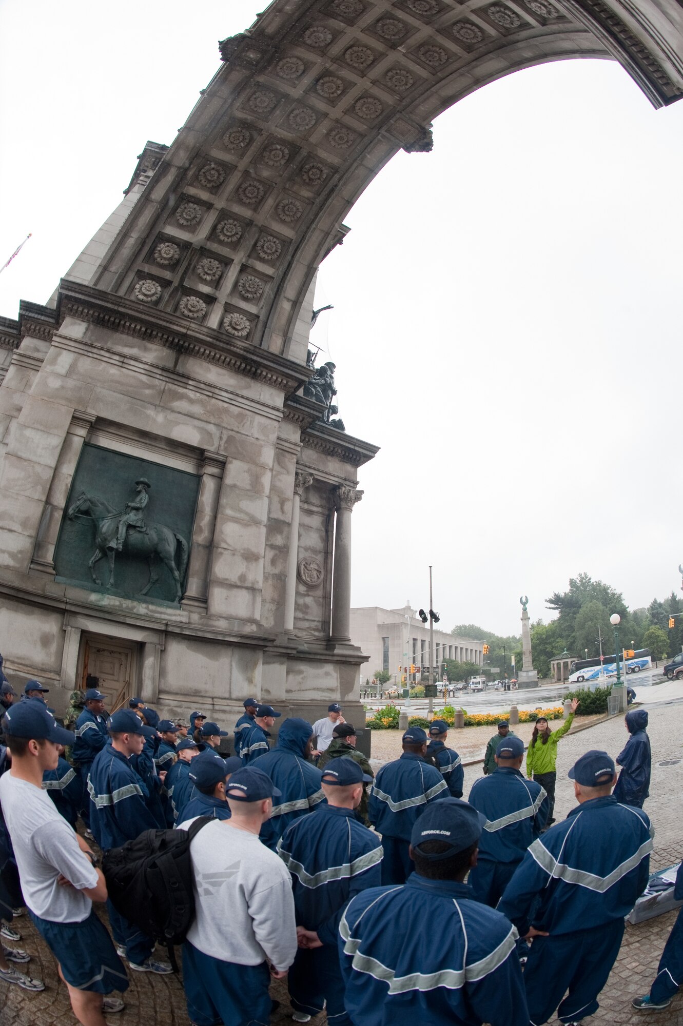 Jessica Jamhoury points up at the Soldiers and Saliors Memorial Arch as speaks about the Grand Army Plaza in Prospect Park during a briefing for the 34 Airmen who participated in the cleanup of the plaza as part of Air Force Week New York's Volunteer Day Aug. 25, 2010, in Brooklyn, N.Y. Ms. Jamhoury is a project coordinator with Prospect Park Alliance, the organization that maintains this New York City park. (U.S. Air Force photo/Lance Cheung)