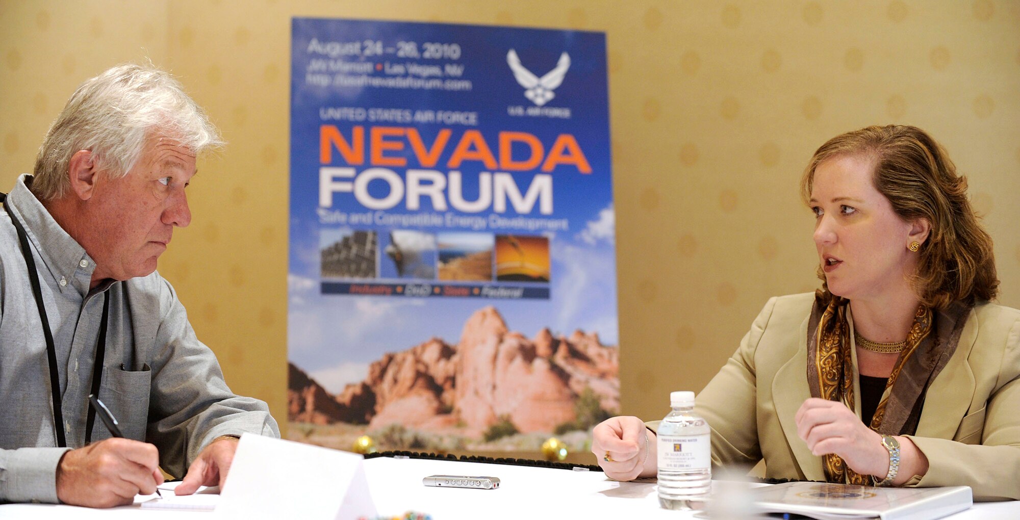 Undersecretary of the Air Force Erin C. Conaton answers a question for Keith Rogers, a reporter with the Las Vegas Review Journal, during a media roundtable following the kick-off of the Nevada Energy Forum, an Air Force-hosted three-day brainstorming to find ways for the service to reduce fossil fuels usage Aug. 24, 2010, in Las Vegas. (U.S. Air Force photo/Scott M. Ash)