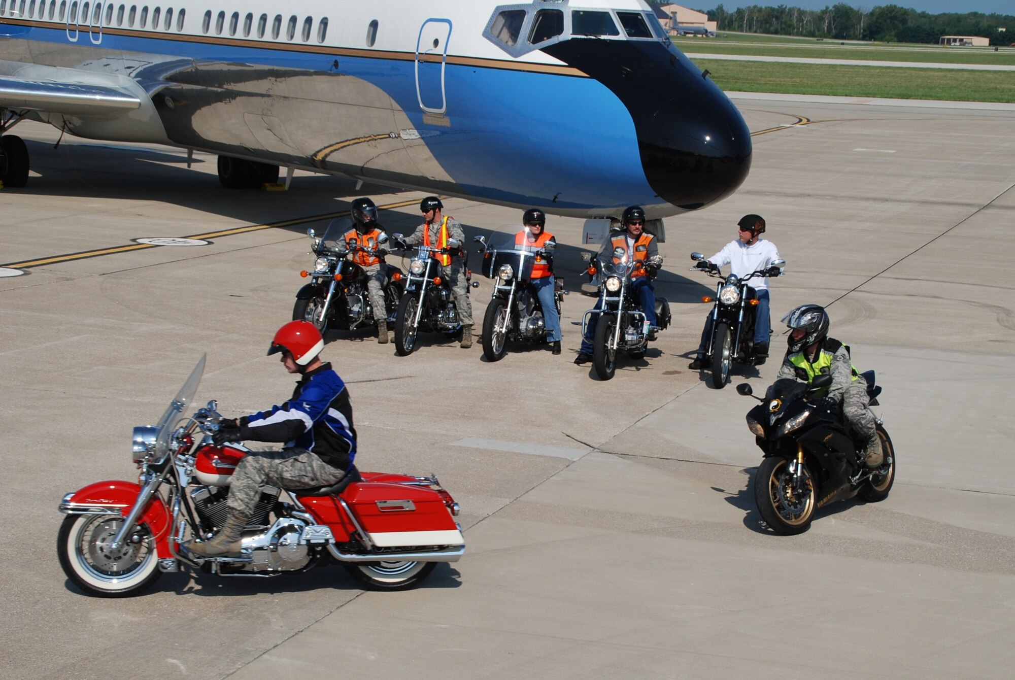 Motorcyclists of the 932nd Airlfift Wing roared down the flightline in their second
annual "Biker Rally."  The rally highlights the safety and fun aspects of riding a motorcycle.  Master Sgt. Matt Berens led the way for 17 Air Force Reserve "bikers."   The 932nd AW is the only Air Force Reserve unit that flies the C-9C (background) aircraft.  (U.S. Air Force photo/Tech. Sgt. Dan Oliver)
