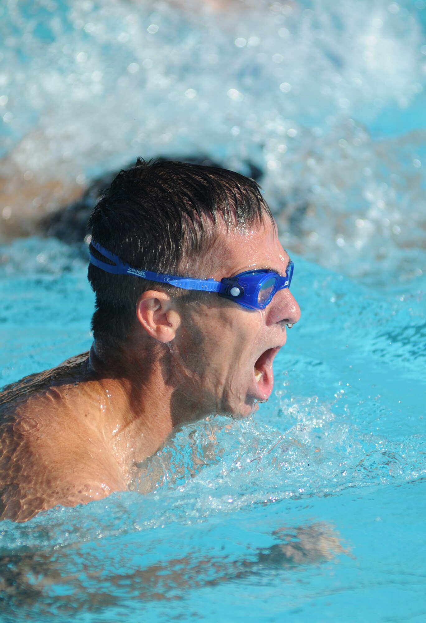 James Sadler, 439th Airlift Wing, participates in Friday's mini-triathlon in the male 50+ category.  He completed the the 200-yard swim, 8-mile bike race and 2-mile run in 59:30.  (U.S. Air Force photo by Kemberly Groue)