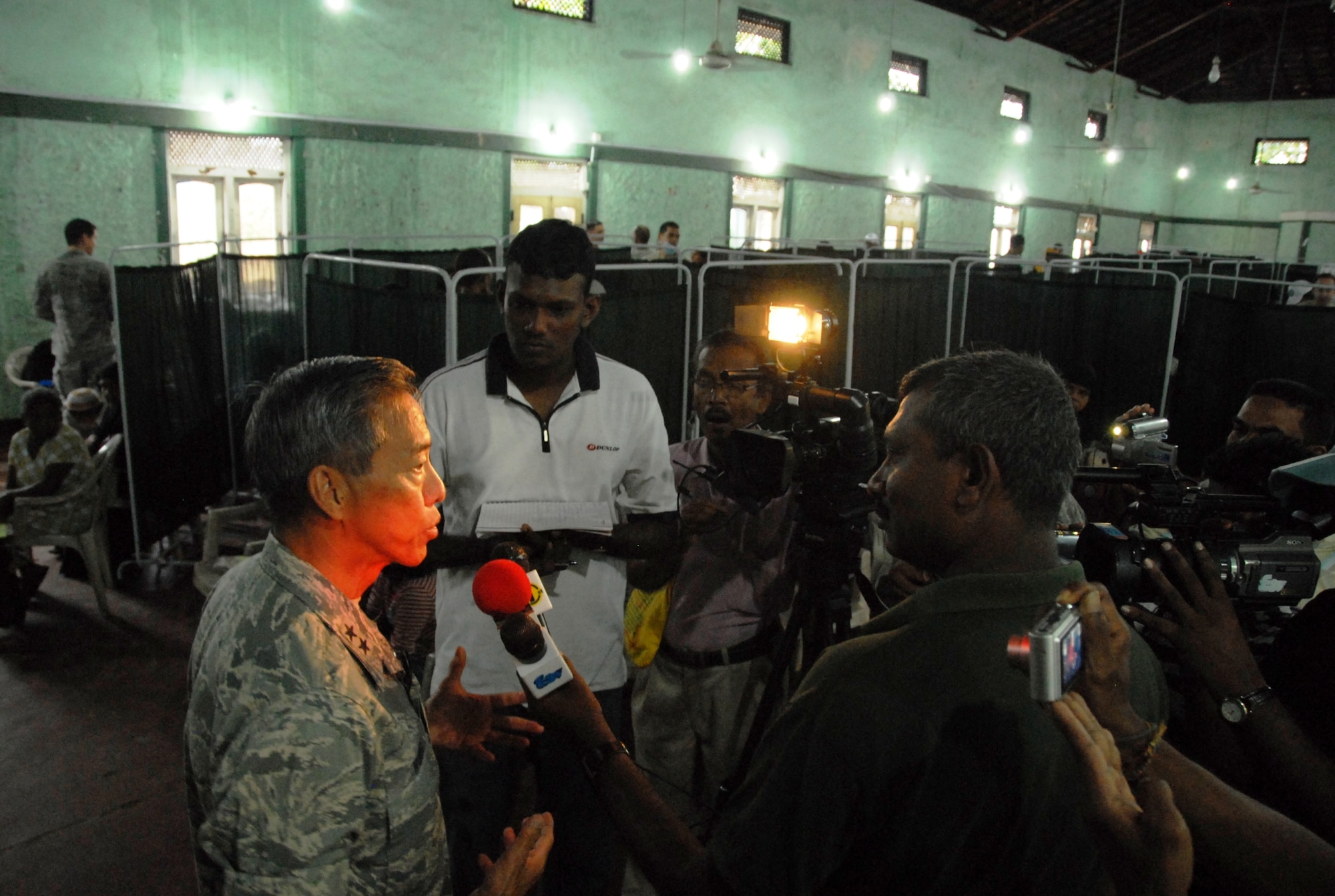 Maj. Gen. Darryll Wong, the Air National Guard Advisor to Pacific Air Forces Commander,  talks to the Sri Lanka media  about the Pacific Angel -Sri Lanka mission that took place in Puttalam Township, Sri Lanka, Aug. 14 through 22, 2010.  More than 40 representatives from the U.S. Air Force, U.S. Army, U.S. Navy, and the U.S. Marines, as well as American public health service practitioners participated in the humanitarian effort.  Pacific Angel is a humanitarian and civic assistance program aimed at improving military civic cooperation between the United States and countries throughout the Asia-Pacific region. (U.S. Air Force photo/ Master Sgt. Mike Hammond) 