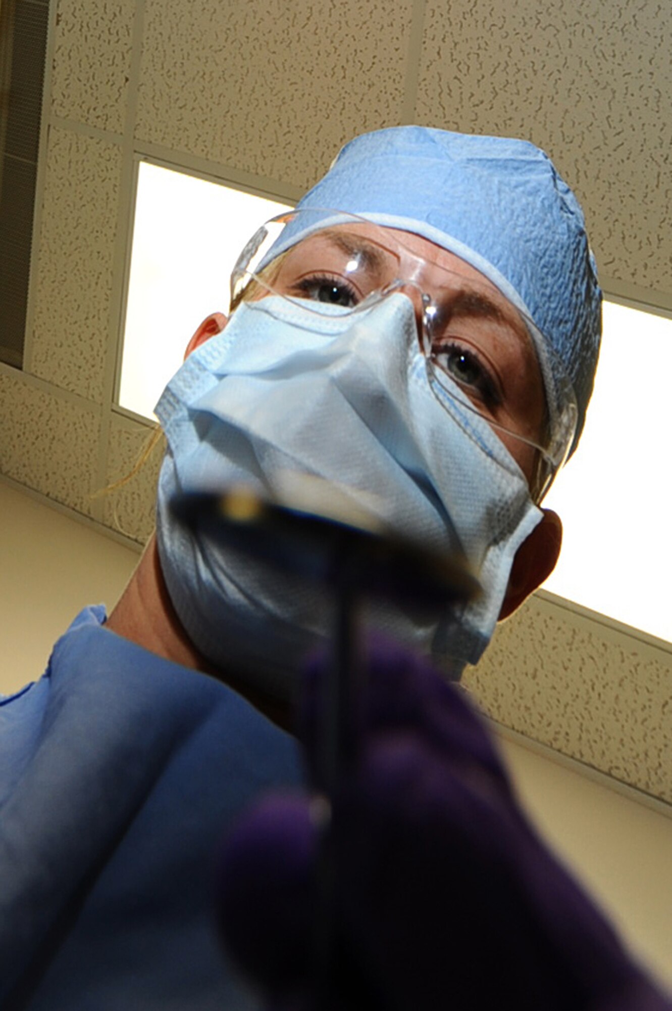 ELLSWORTH AIR FORCE BASE S.D. – Staff Sgt. Kristen Pool, 28th Medical Operations Squadron dental hygienist, prepares to clean a patient’s teeth during annual dental exam, Aug. 24.  (U.S. Air Force photo/Senior Airman Kasey Close)