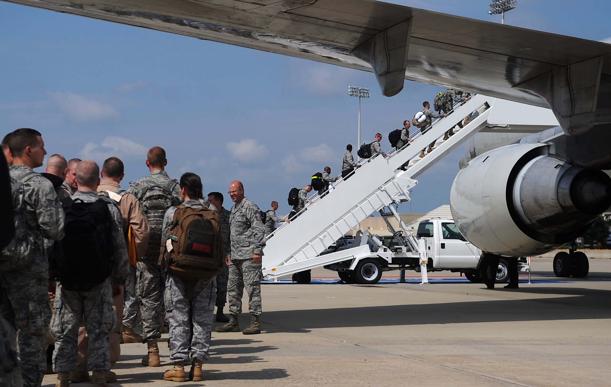 SEYMOUR JOHNSON AIR FORCE BASE, N.C. – More than 200 members of the 4th Fighter Wing board an aircraft enroute to support Operation Enduring Freedom Aug. 22, 2010. These Airmen are support personnel, maintainers, pilots and weapons system officers deploying to execute the close air support mission from Bagram Airfield, Afghanistan. (U.S. Air Force photo/Senior Airman Makenzie Lang)
