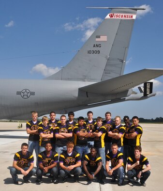 MILWAUKEE -- Seventeen senior students of the Cudahy High School varsity football team visit the 128th Air Refueling Wing on Wednesday, August 25, 2010, to receive a team photo.  The football players posed near a 128 ARW KC-135R Stratotanker for photos that will be used on their team programs during home games.  Josh Harrold, the Cudahy Packers quarterback (#12 in the photograph), said, "I feel honored [to have such a photograph taken].  You serve our country, and it's a great thing you do."  (U.S. Air Force photo by Staff Sgt. Jeremy Wilson / Released)
