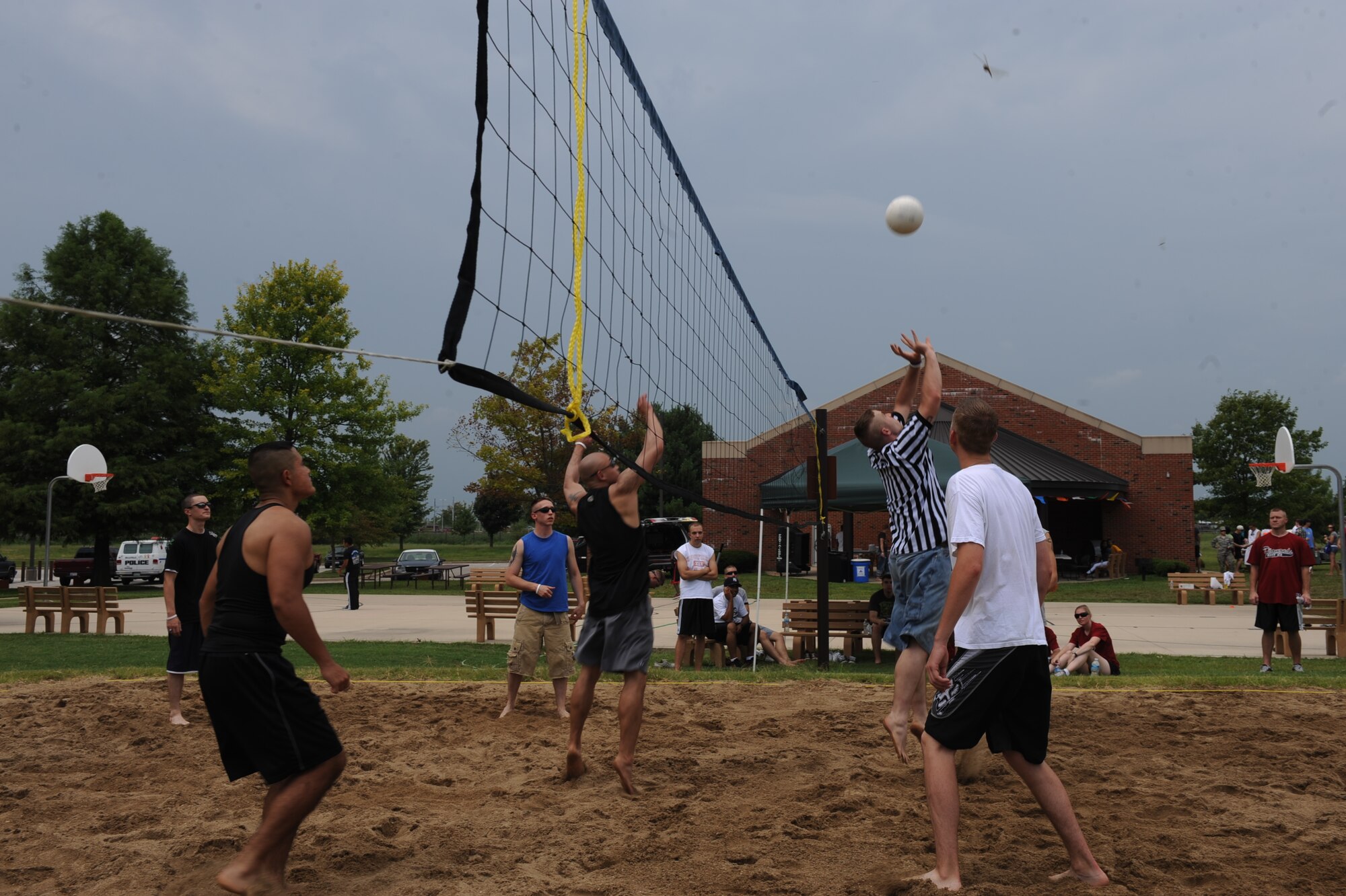 SCOTT AIR FORCE BASE, Ill. -- Airman 1st Class Eric Dudley, 375th Communications Squadron server administrator, prepares to hit the ball back over the net during the volleyball tournament. (U.S. Air Force photo/Senior Airman Tristin English)