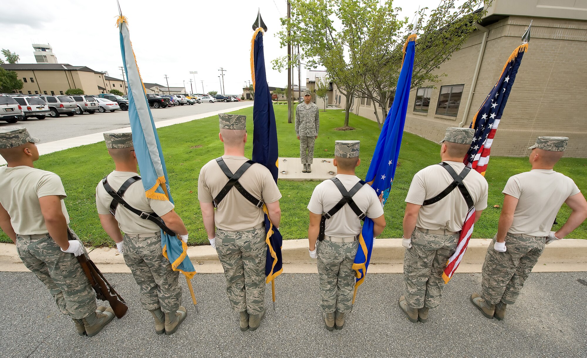 Airman 1st Class Jordan Anderson, U.S. Air Force Honor Guard, instructs Team Dover members on Honor Guard detail duties during training at the Base Honor Guard on Dover Air Force Base, Del., Aug. 13, 2010. Instructors from the U.S. Air Force Honor Guard visited to train Team Dover members on various Honor Guard duties. (U.S. Air Force photo by Jason Minto/Released)