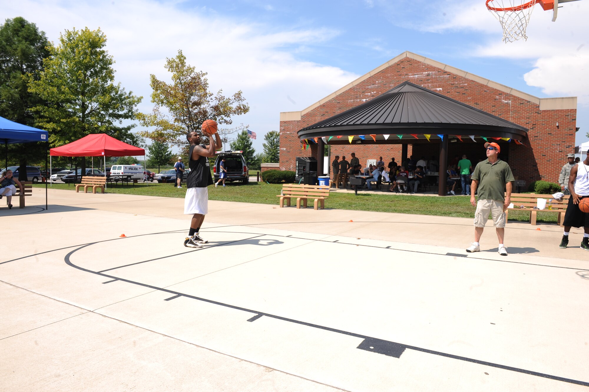 SCOTT AIR FORCE BASE, Ill. -- Airman 1st Class Michael Brooks, 375th Communications Squadron client systems technician, participates in the free throw competition. After performing free throws Airmen then try to shoot free throws with beer goggles on. (U.S. Air Force photo/Senior Airman Tristin English)
