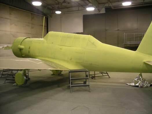 The BT-13 Valiant recieves its primer coat of paint. [US Air Force Photo]