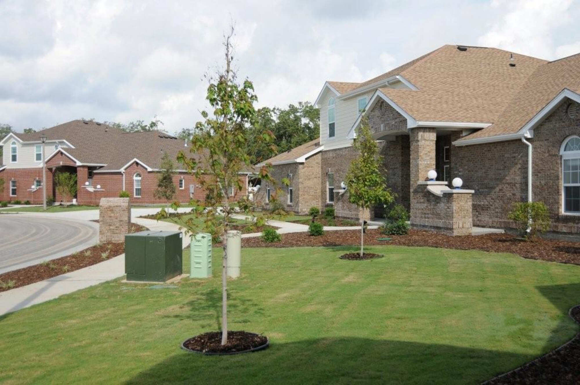 April 19, the last of 1,028 new homes was turned over to Keesler, as the largest military family housing construction project in Air Force history came to a close.  The $287.8 million project took nearly three years and was completed nearly four months ahead of schedule.  The three- and four-bedroom homes, which average about 1,800 to 2,000 square feet, are equipped with garages and outdoor living spaces tucked into neighborhoods with playgrounds, basketball courts and walking paths.   (U.S. Air Force photo by Kemberly Groue)
