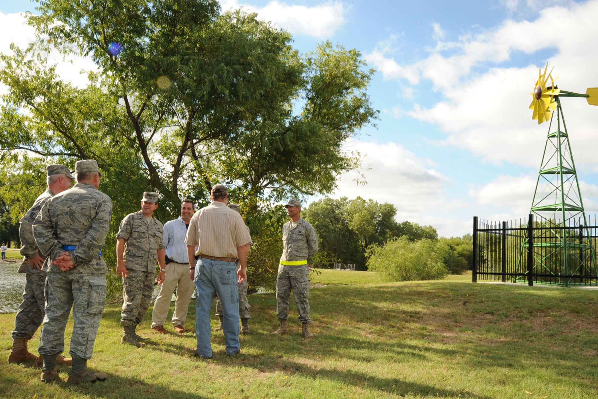 Maj. Gen. Timothy Byers, U.S. Air Force Headquarters Civil Engineer, speaks to McConnell’s 22nd Civil Engineer and Force Support Squadron leadership members during his site visit to a contingency construction project at the Krueger Recreation Area Aug. 18, 2010, McConnell Air Force Base, Kan.  Engineers are building communal showers and laundry facilities in the recreation area to match similar structures currently under construction by deployed engineers in Afghanistan.  These construction projects help 22nd CES Airmen prepare for wartime deployment construction projects where structures are built from the bare foundation to the roof, to include the concrete pad, electrical, plumbing and heating and ventilation aspects.  The 22nd CES is the only Air Mobility Command base to currently have contingency work order credit to assist in funding for other similar projects in the future.  (U.S. Air Force photo/Senior Airman Maria Ruiz)
